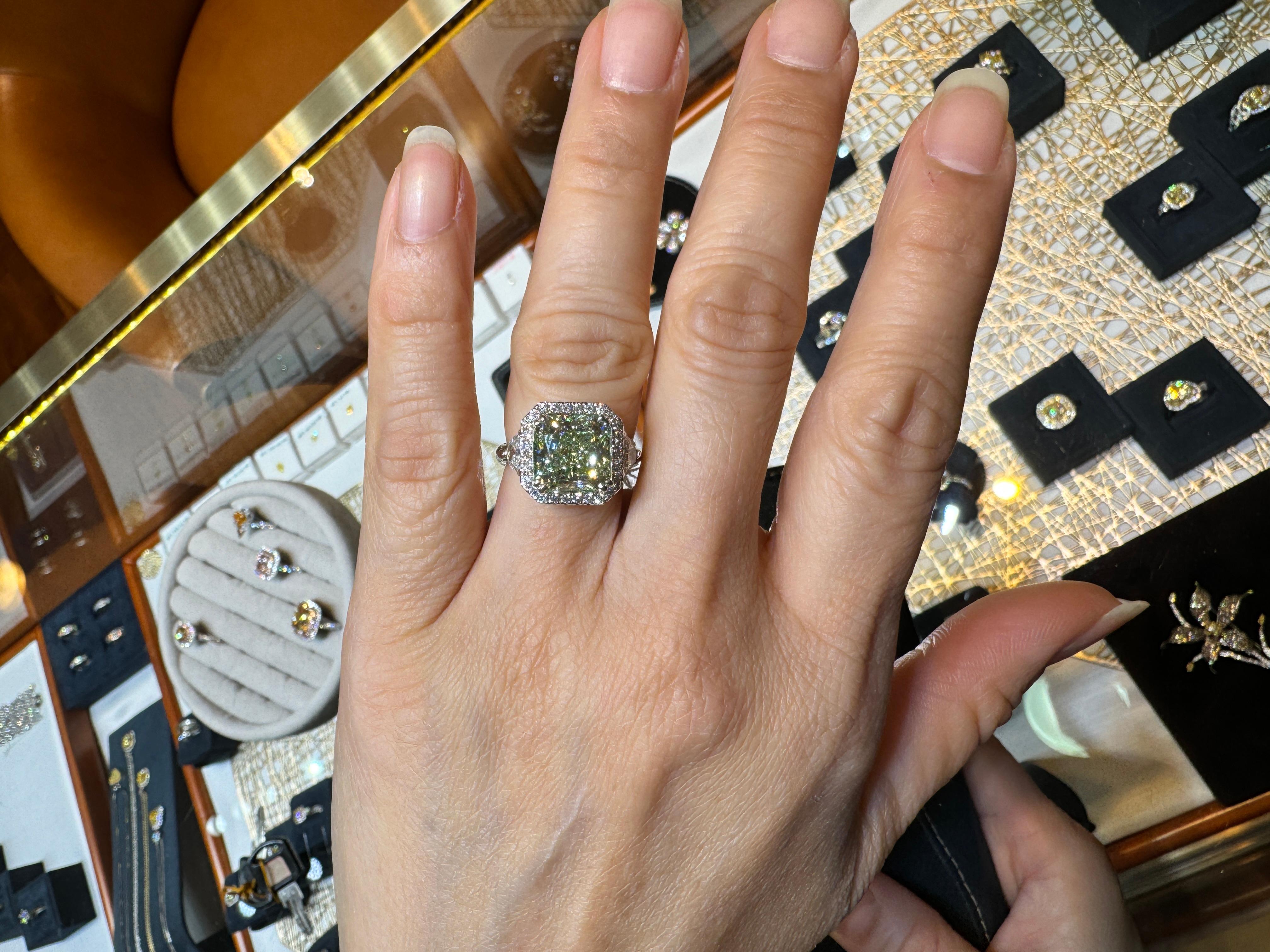 4.26 Carat Radiant Cut Fancy Yellowish Green SI1 Clarity 18K GIA Diamond Ring For Sale 11
