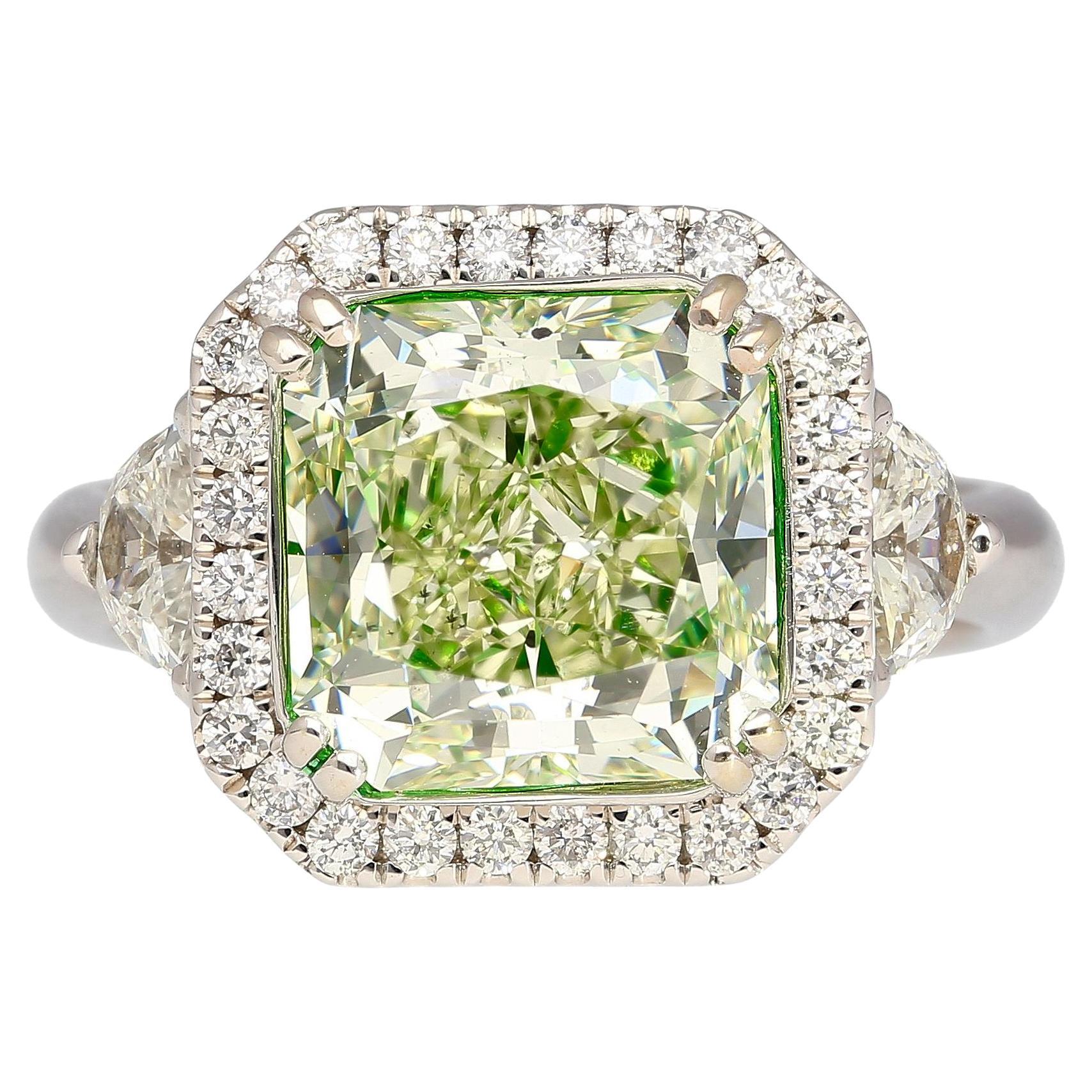 4.26 Carat Radiant Cut Fancy Yellowish Green SI1 Clarity 18K GIA Diamond Ring For Sale