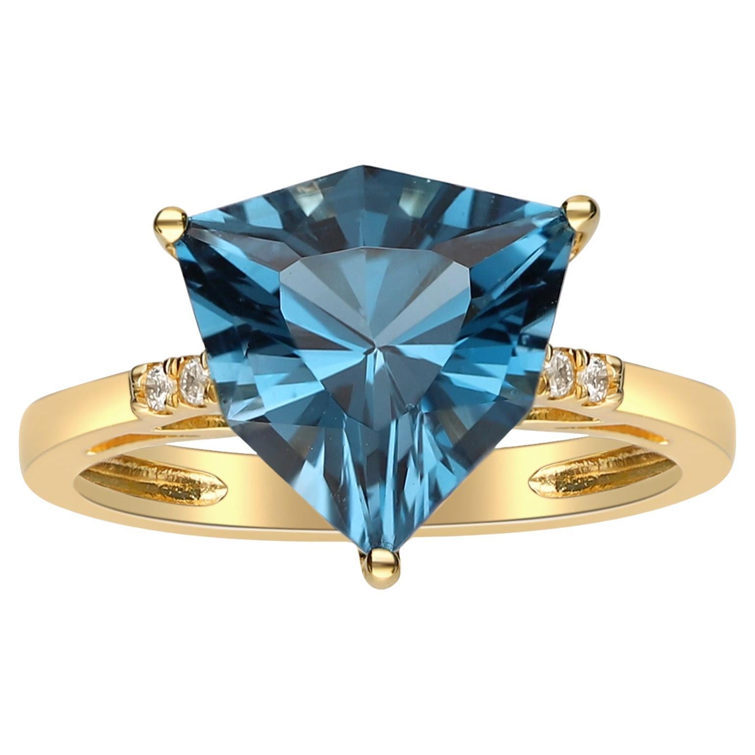 Bague en or jaune 14 carats avec diamants et topaze bleue de Londres taille trillion de 4,26 carats