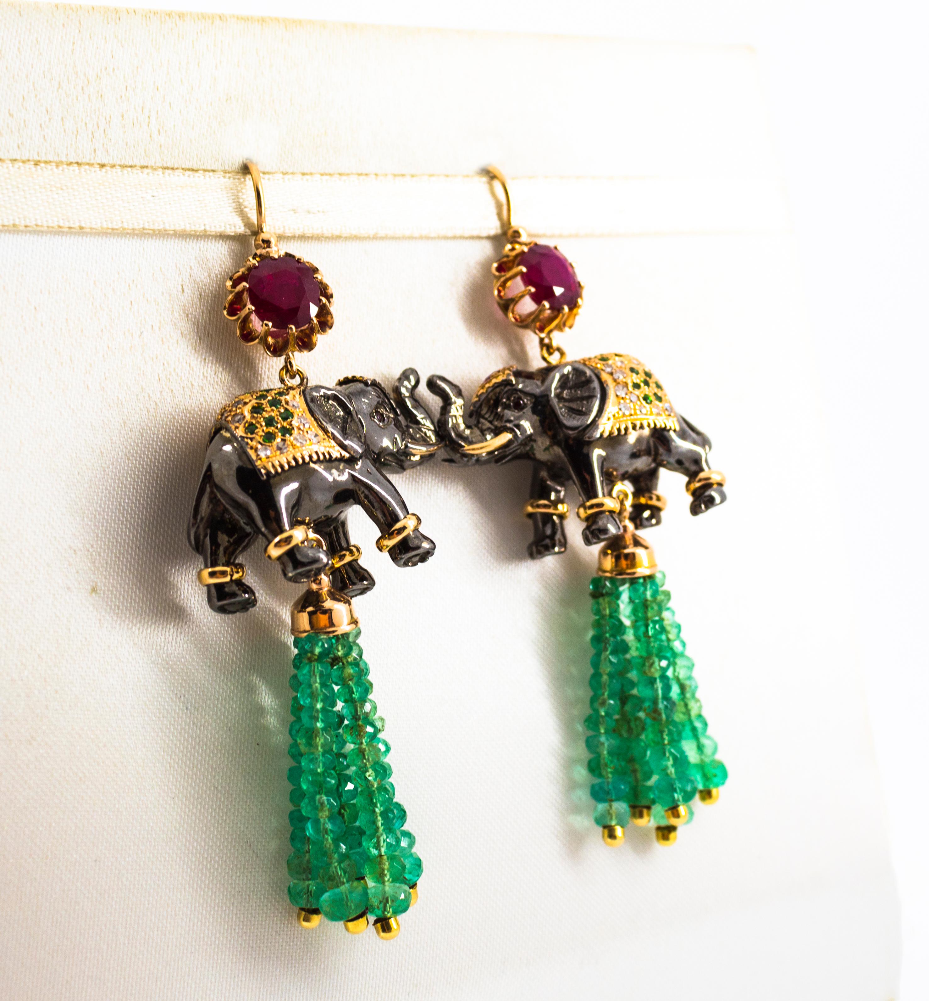 Brilliant Cut 42.60 Carat White Diamond Emerald Ruby Tsavorite Yellow Gold Elephants Earrings For Sale