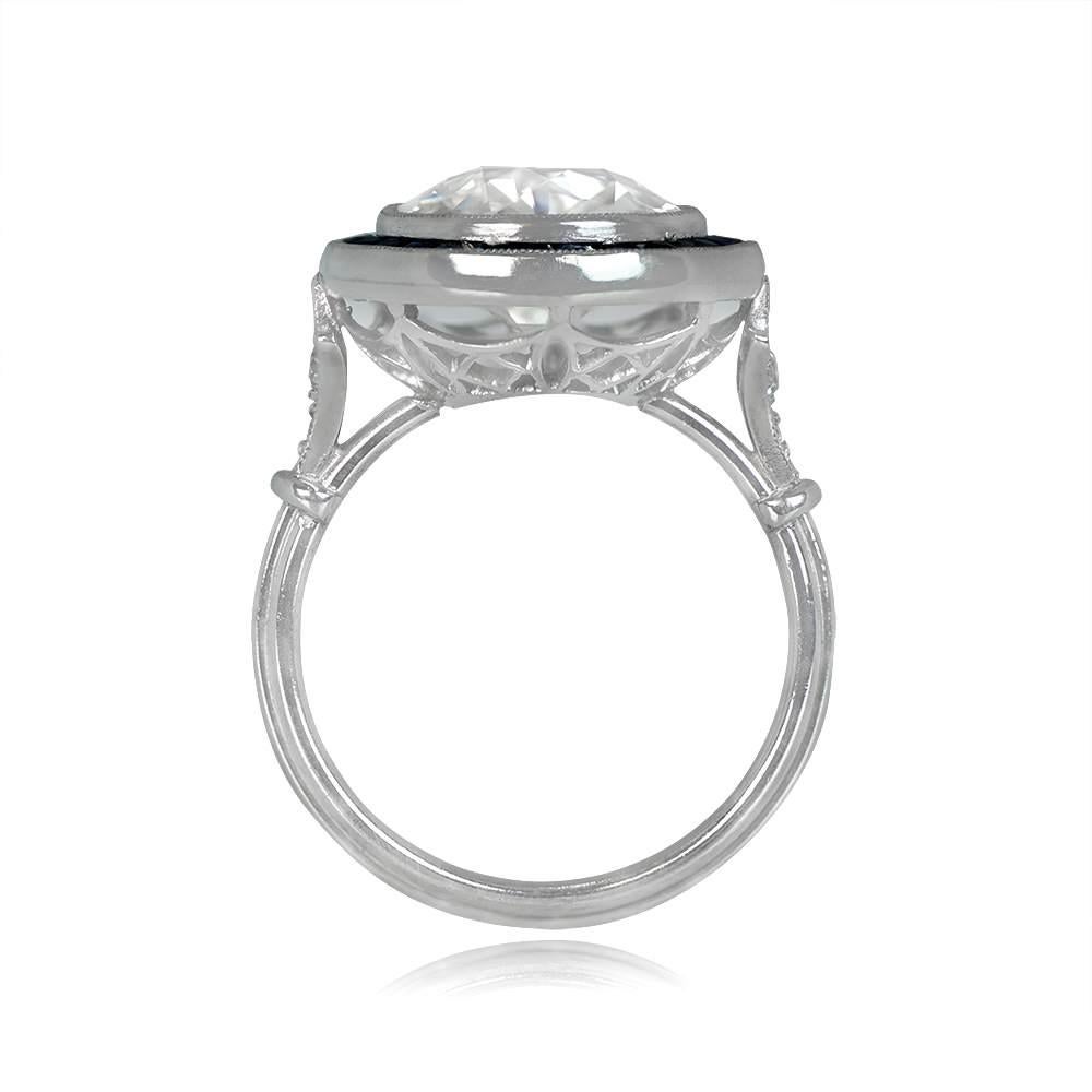This lovely engagement ring, handcrafted in platinum by our skilled European jewelers, features a 1.54-carat old European cut diamond with K color and VS2 clarity. The ring's intricate design is inspired by the Edwardian Era and boasts fine