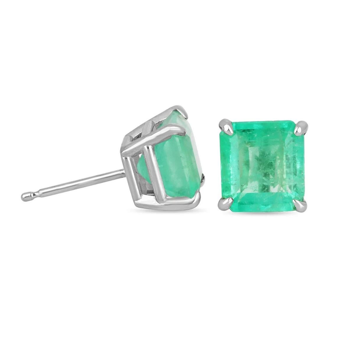 A classic pair of Asscher-cut green natural Colombian emerald gold studs 14K Gold. These earrings feature two lively, natural Colombian emeralds that are handset in a single four-prong setting. These stones were sourced by the best emerald mine in