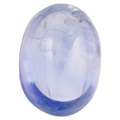 Saphir naturel du Sri Lanka ovale cabochon bleu violet certifié IGI de 4.27 carats