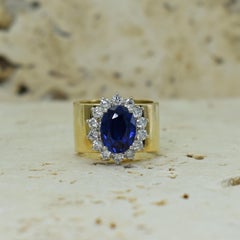 4.27 Carat Oval Blue Sapphire and Diamond Halo 14k Gold Cocktail Ring