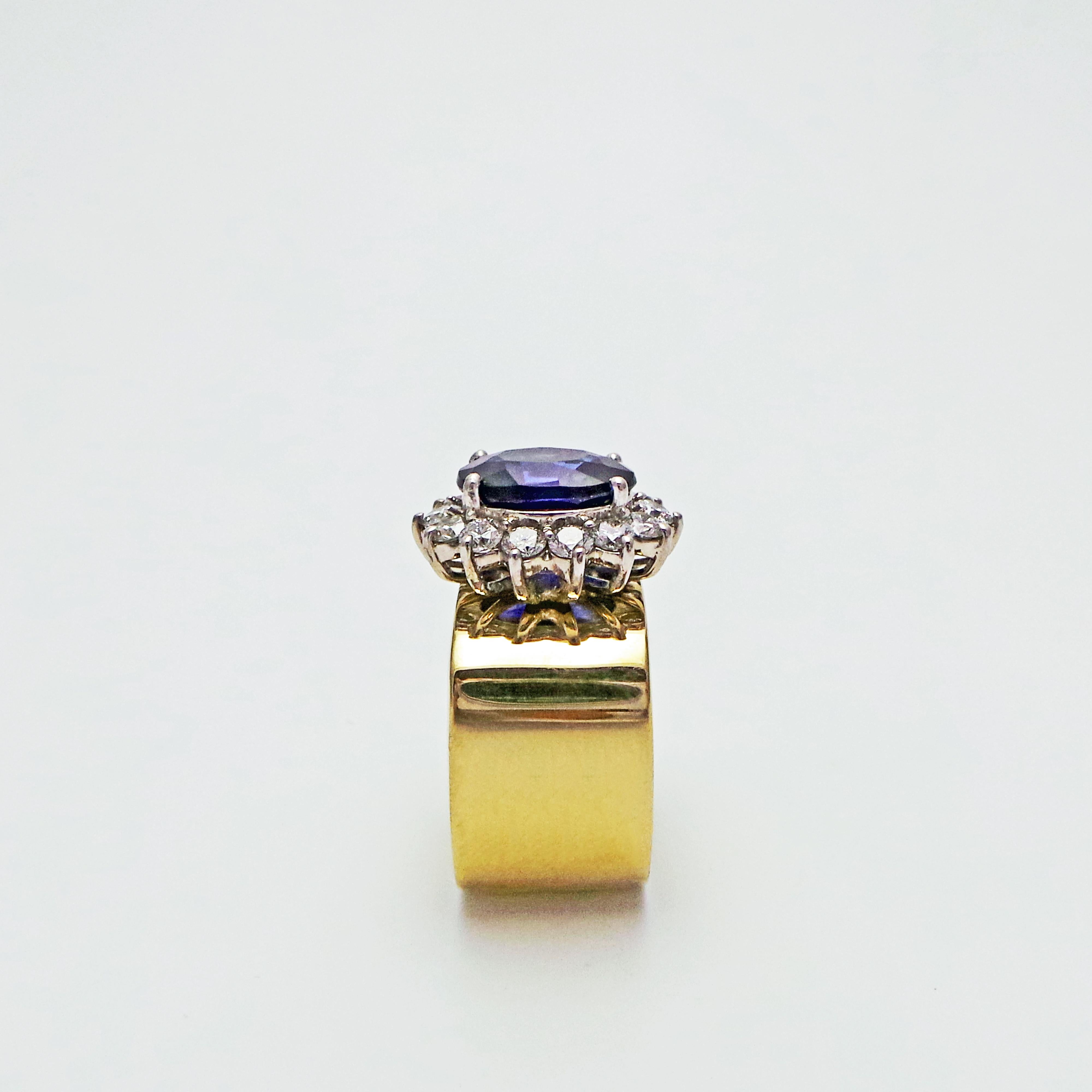 Contemporary 4.27 Carat Oval Sapphire and Diamond Halo Gold Cocktail Ring