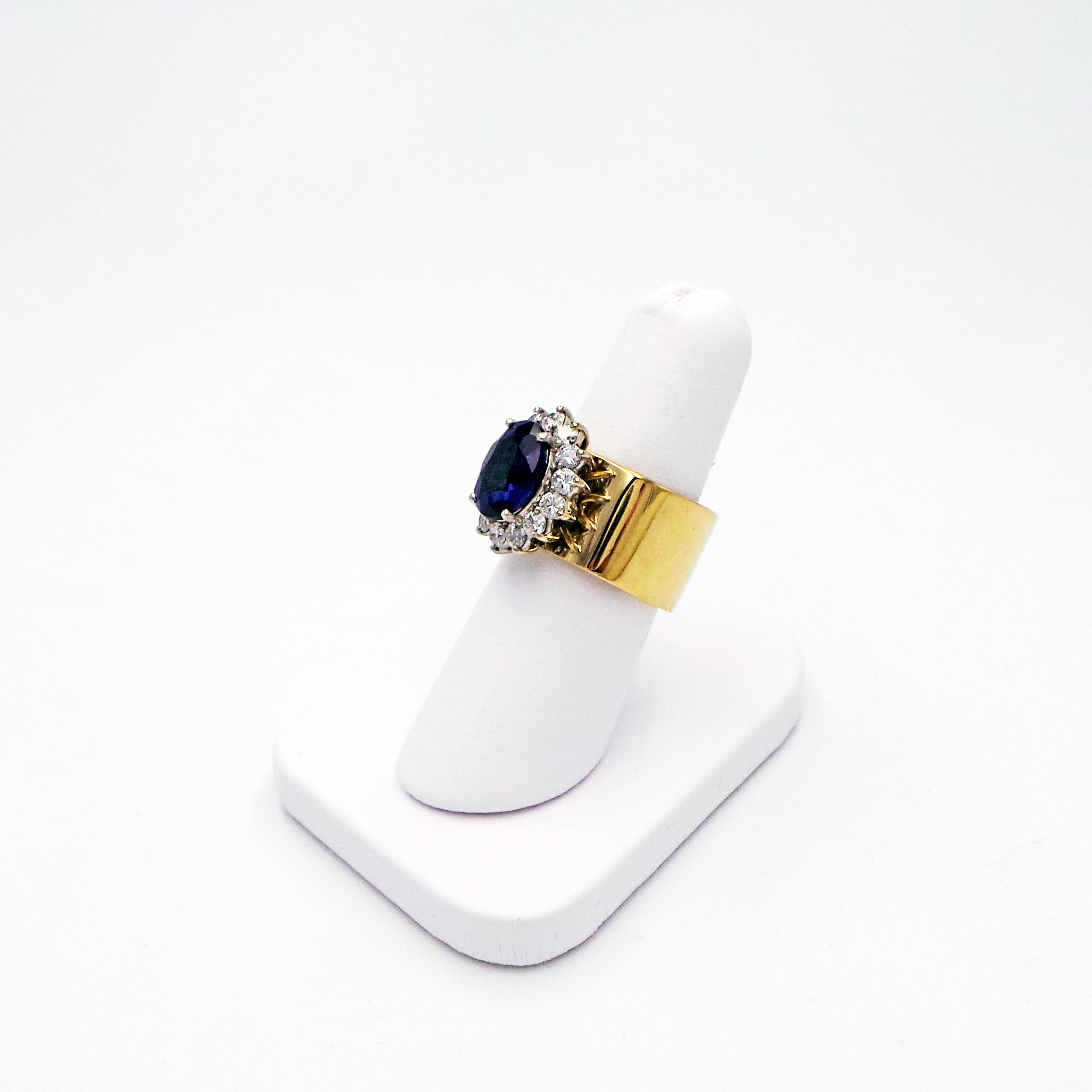 Women's 4.27 Carat Oval Sapphire and Diamond Halo Gold Cocktail Ring