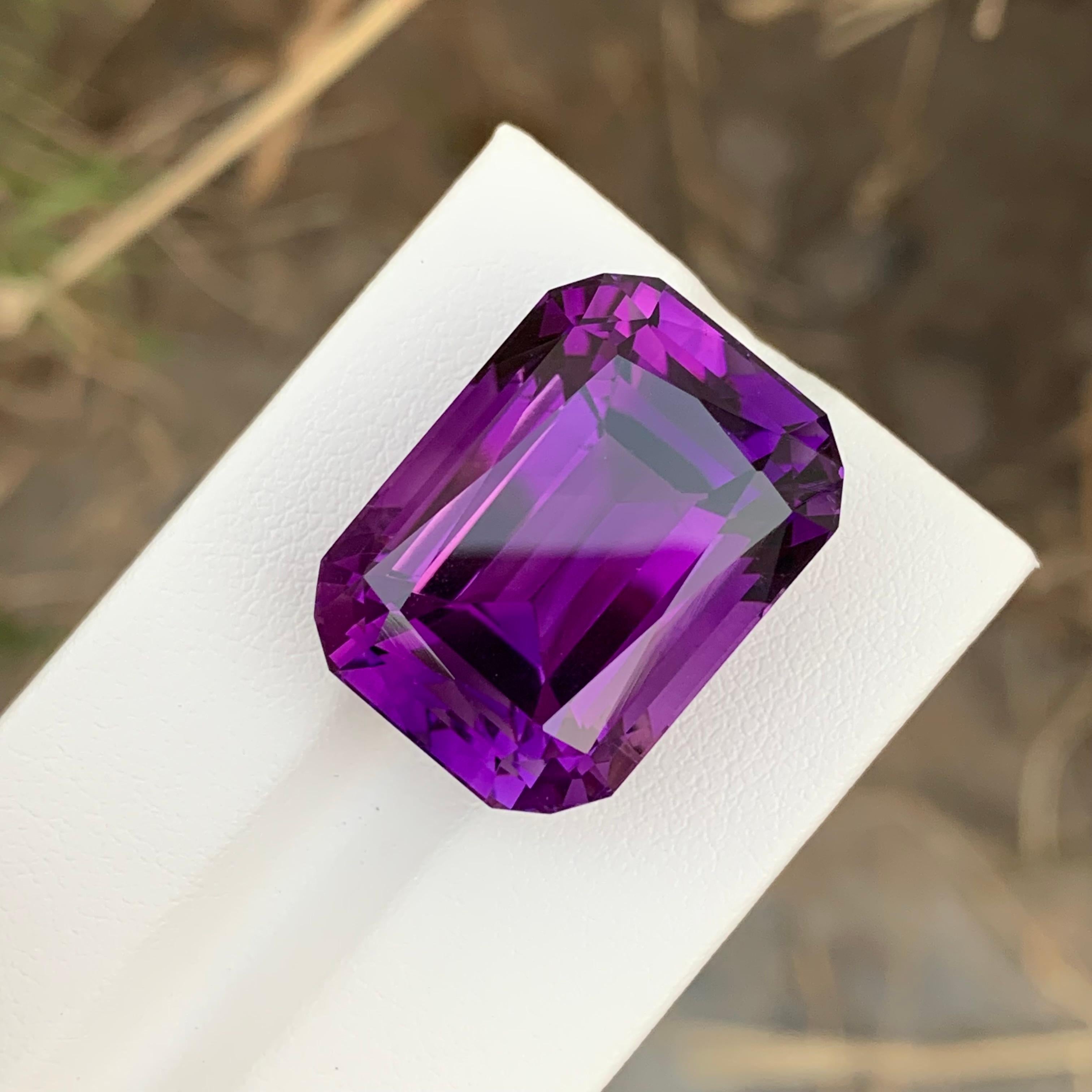 Loose Amethyst 
Weight: 42.70 Carats 
Dimension: 23 x 17.1 x 14.9 Mm
Colour: Dark Purple 
Origin: Brazil
Treatment: Non 
Certificate: On Demand 
Shape: Emerald 


Amethyst, a stunning variety of quartz known for its mesmerizing purple hue, has