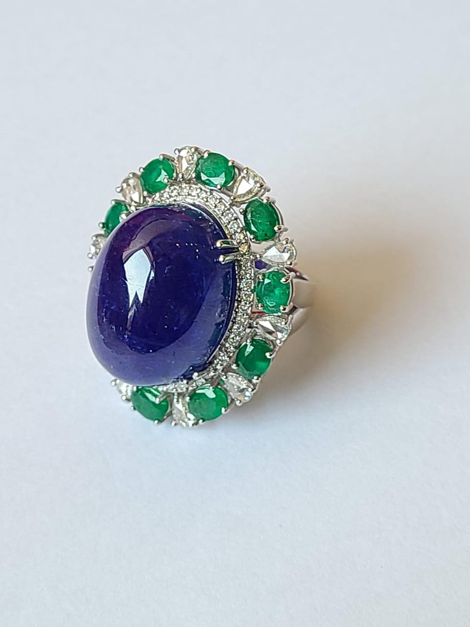 Art Deco 42.70 Carats, Natural Tanzanite Cabochon, Emerald & Diamonds Cocktail/ Dome Ring