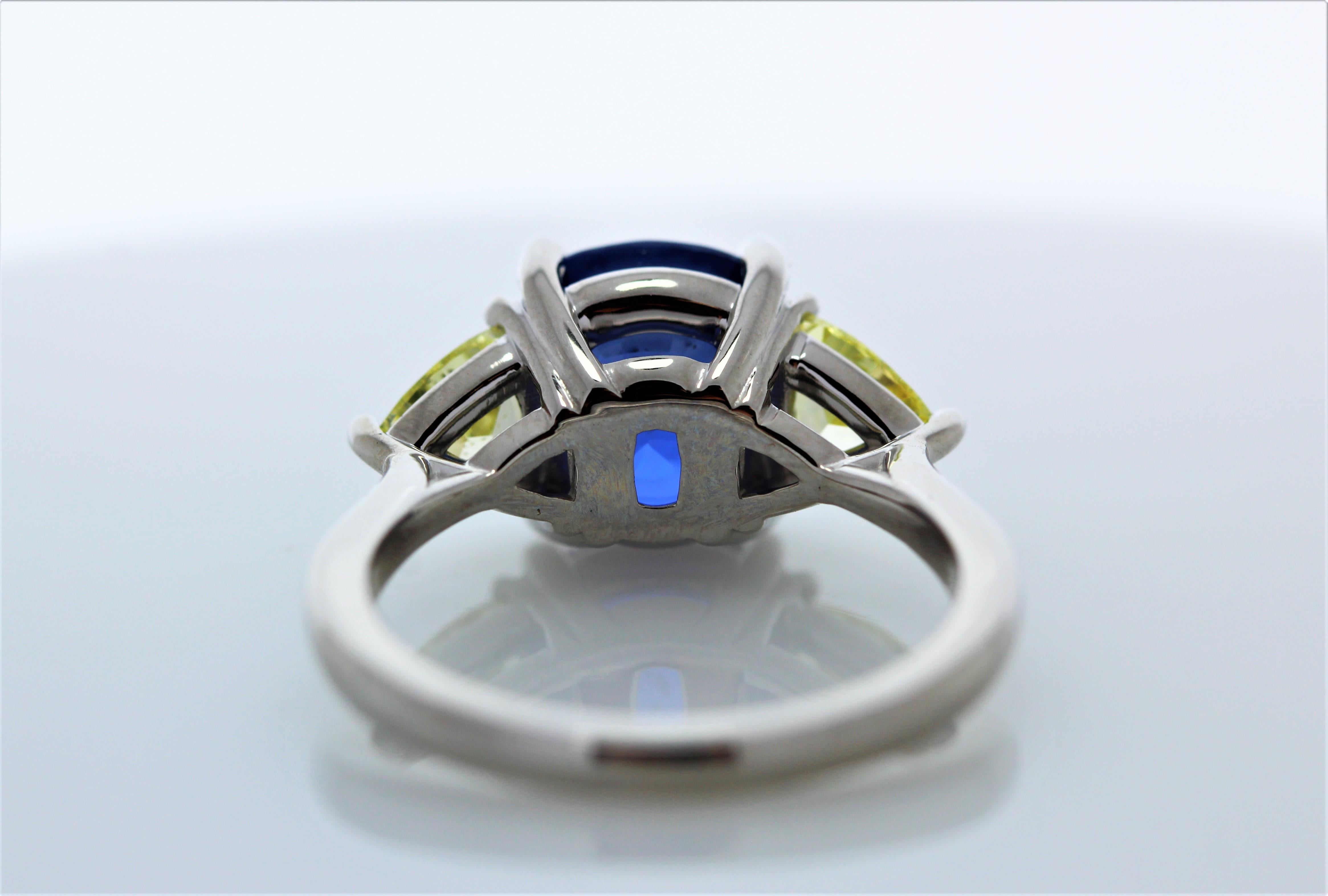 Contemporary 4.27CT Blue Sapphire and .92CTW Diamond Ring in 18K White Gold For Sale