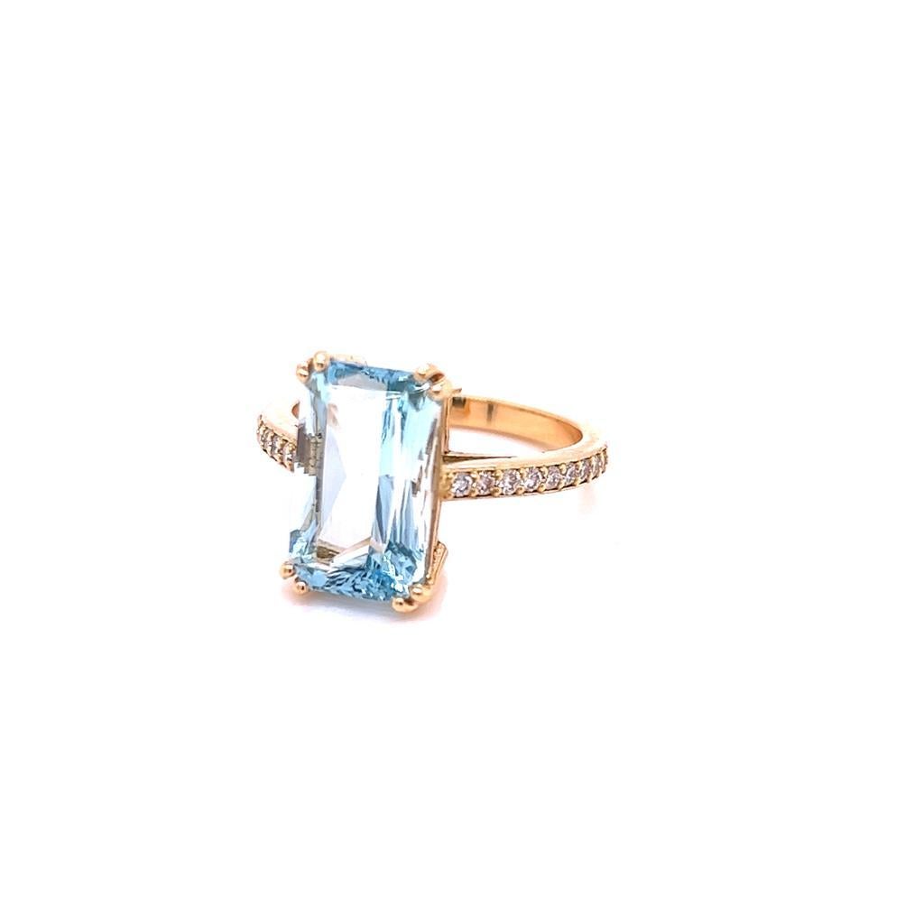 4.28 Carat Emerald cut Aquamarine and Diamond Ring in 18K Yellow Gold.

This Alluring ring features a resplendent 4.28 Carat Emerald cut Aquamarine. Held in an 18K Yellow Gold claw setting and accompanied by shoulder Diamonds, this marvellous