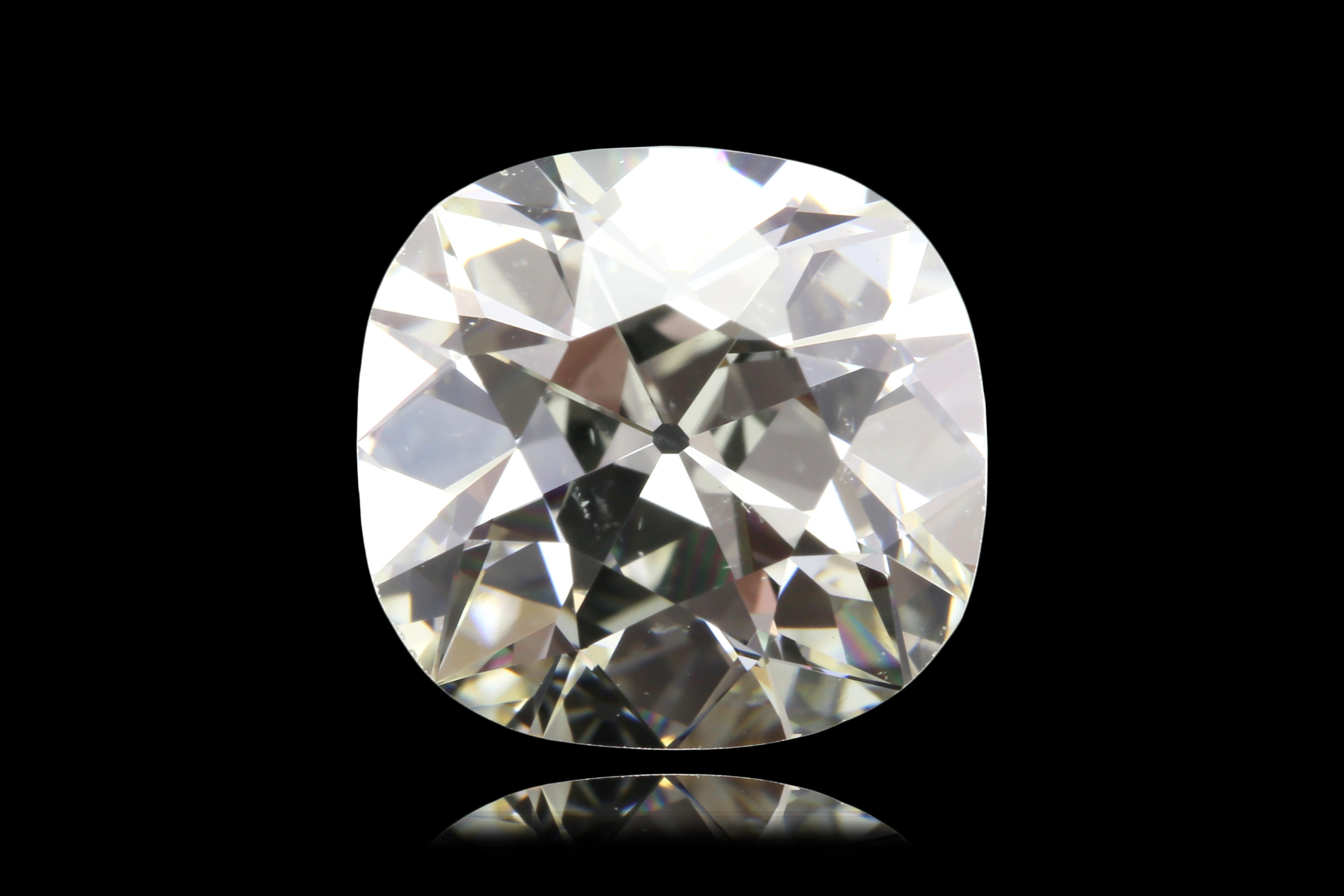 A diamond of timeless charm and historical allure, this 4.28-carat Old Mine Cut diamond carries with it the romance of antique craftsmanship paired with the assurance of modern certification. GIA certified, it is graded M in color and SI1 in