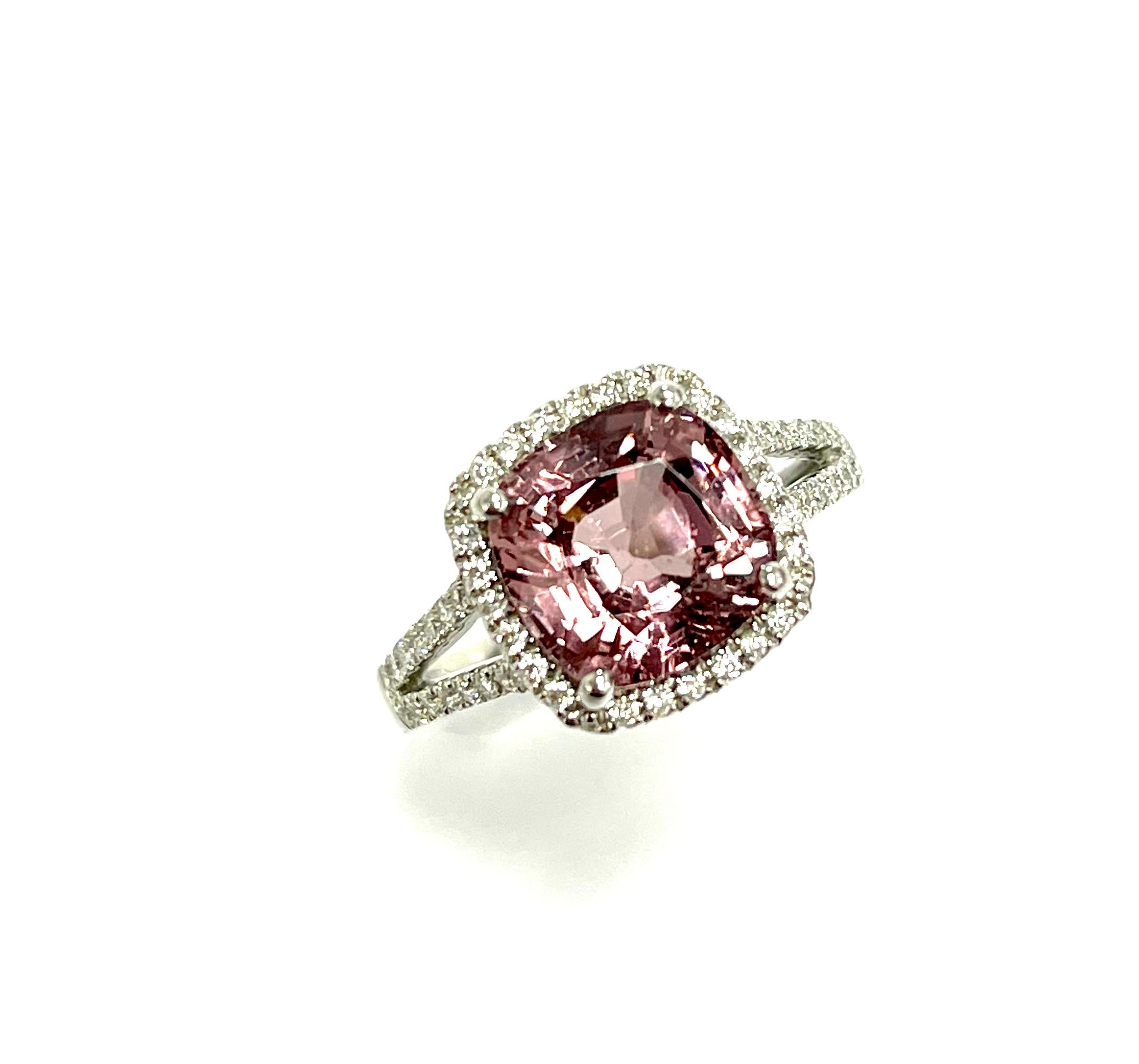 4.28  Carat cushion fancy color spinel set in 18k white gold ring with 0.37 carat diamonds around it and half way on the split shank.