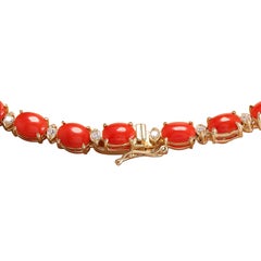 Collana di corallo naturale e diamanti in oro giallo 14 carati