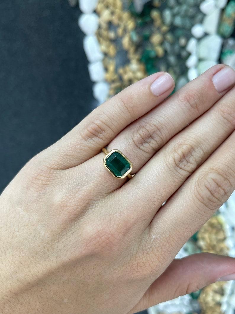 Contemporary 4.28ct 14K Natural Dark Alpine Green Emerald Cut Solitaire Gold Ring For Sale