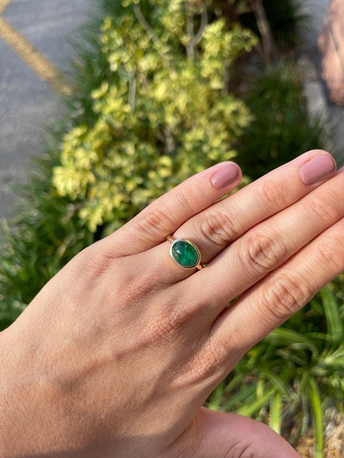 cabochon cut emerald