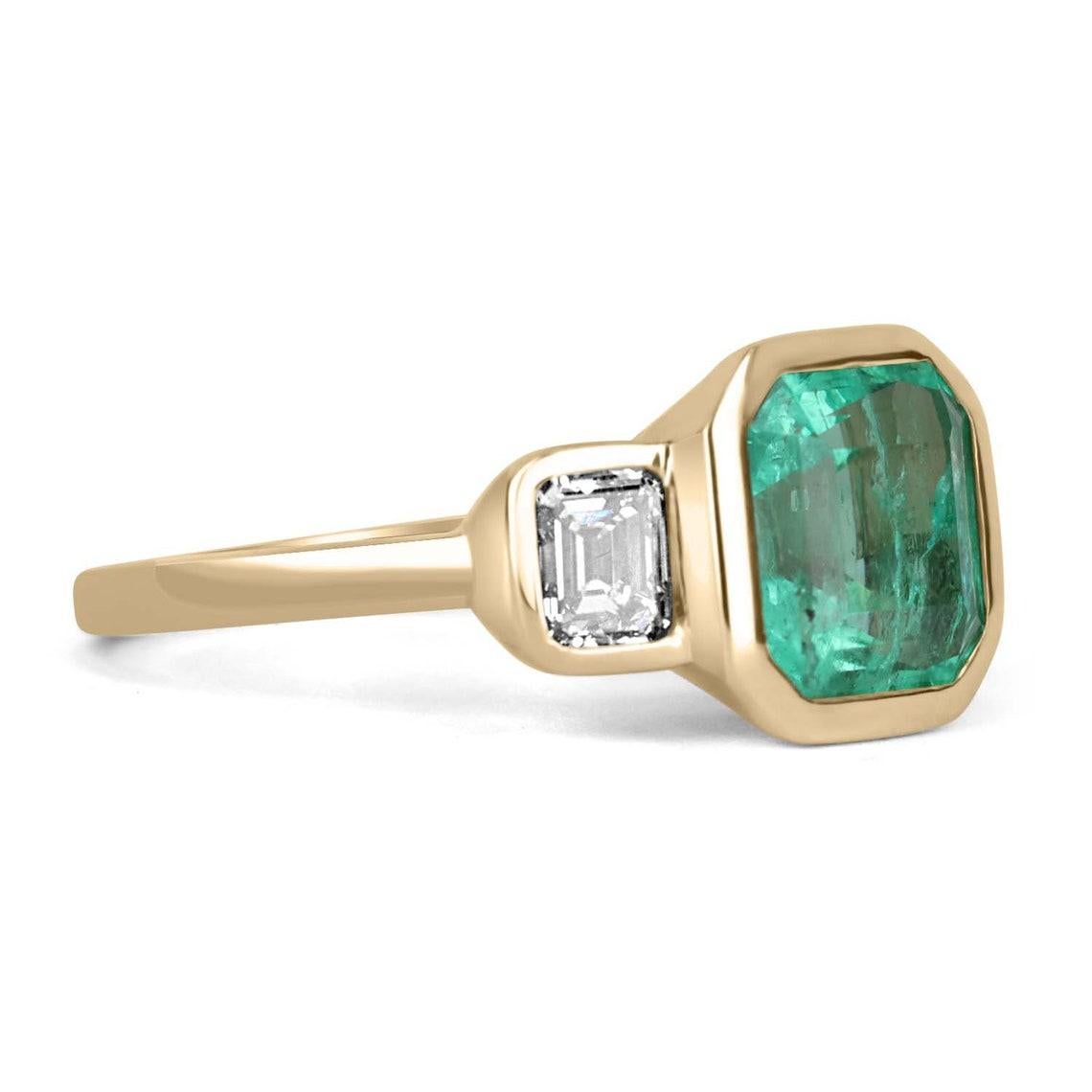 Dexterously handcrafted in gleaming 18K yellow gold, this ring features a high quality, 3.30-carat natural Colombian emerald Asscher cut from the famous Muzo mines. Set in a secure bezel setting for extra protection. This extraordinary emerald has