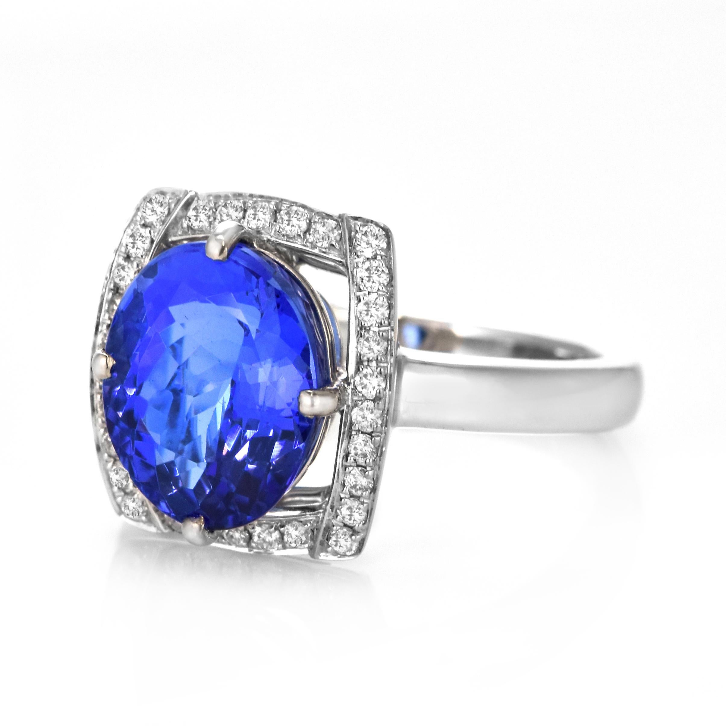 Modern 4.29 Carat Natural 'AAA' Tanzanite and Diamond Ring Made in 18 Karat White Gold For Sale