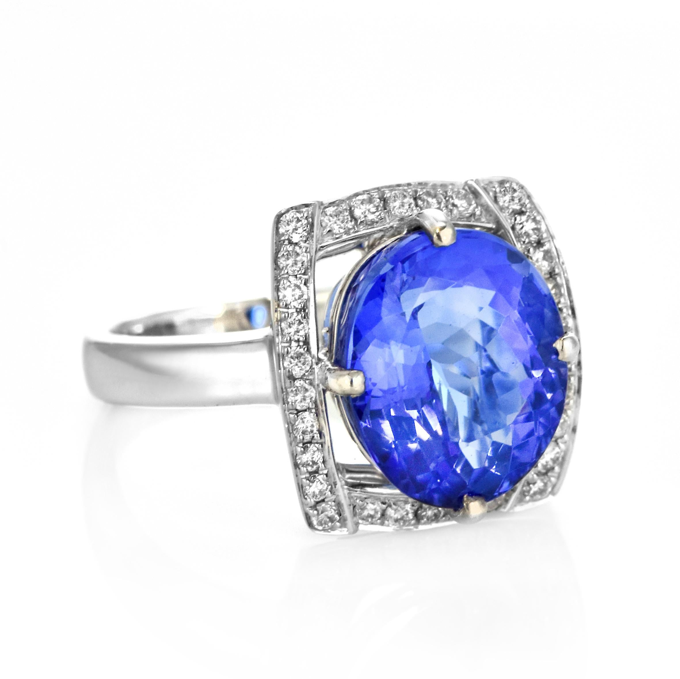 Oval Cut 4.29 Carat Natural 'AAA' Tanzanite and Diamond Ring Made in 18 Karat White Gold For Sale