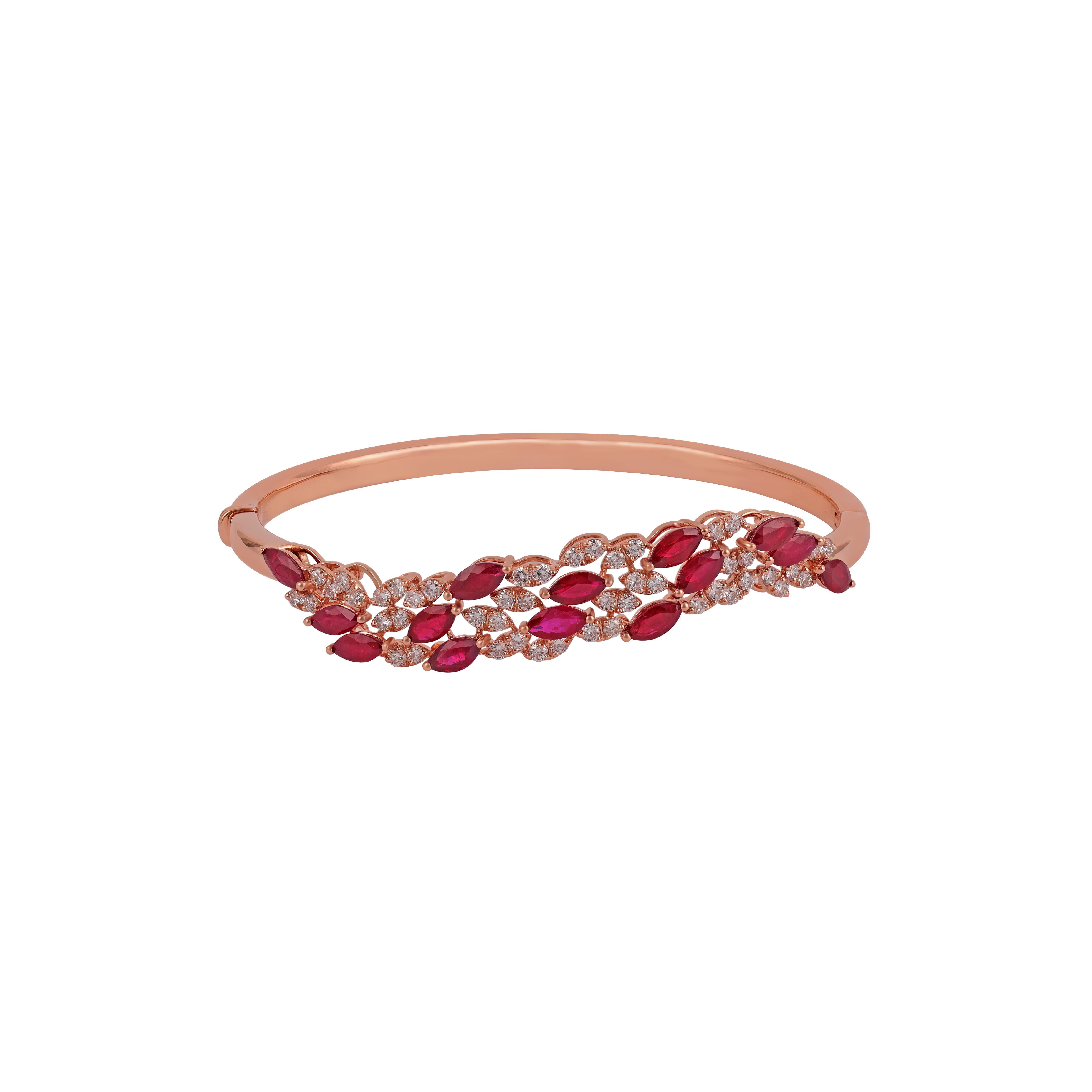 4.29  Carat Natural Burma Ruby Bangle with Diamonds in 18k Rose Gold

Ruby 4.29 carats with  Diamond 1.26, Bangle set in 18 Karat Gold Settings
Gold - 15.31 Gm.

Size 7 Inch's

The width and size of the bracelet can be changed.
This piece can be