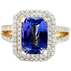 Bague en or jaune massif 14 carats avec tanzanite naturelle et diamant 