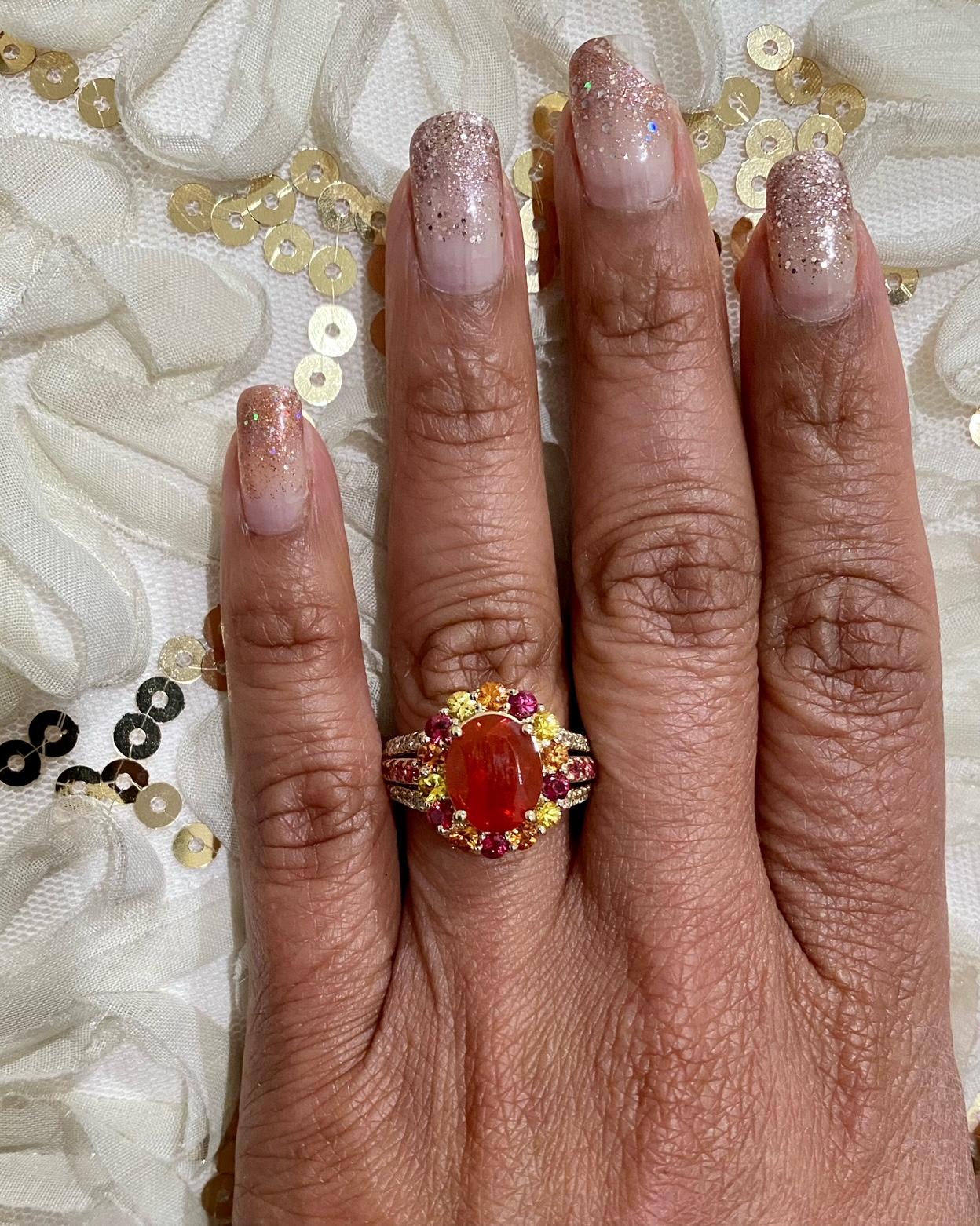 Women's 4.29 Carat Oval Cut Fire Opal Sapphire Diamond Yellow Gold Cocktail Ring For Sale