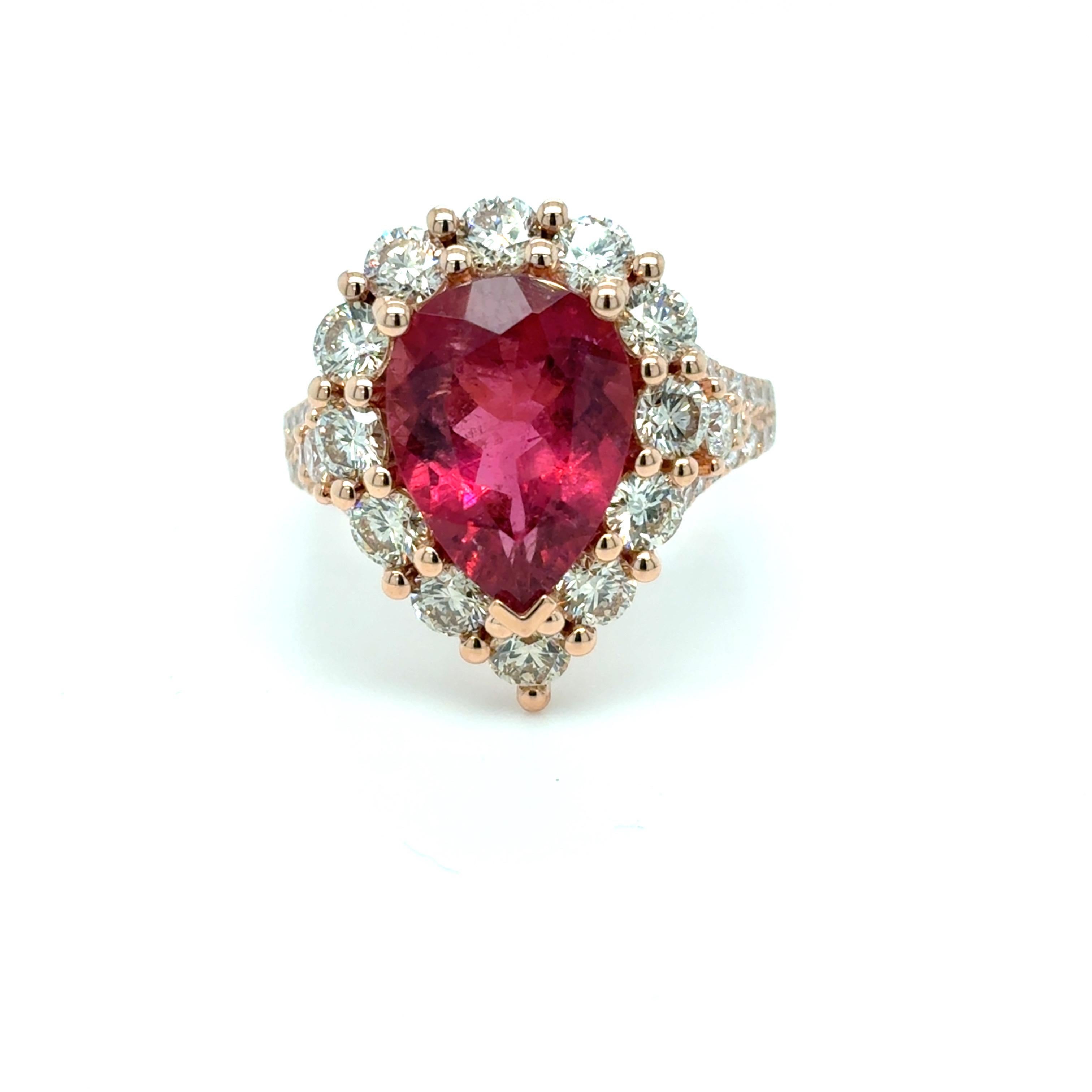 4.29 Carat Pear-Cut Rubellite and Diamond Halo Ring
This exquisite ring features a lustrous 4.29 carat pear-cut pink rubellite, surrounded by a sparkling 2.27 carat diamond halo. Crafted in luxurious 18K rose gold, it showcases a beautifully