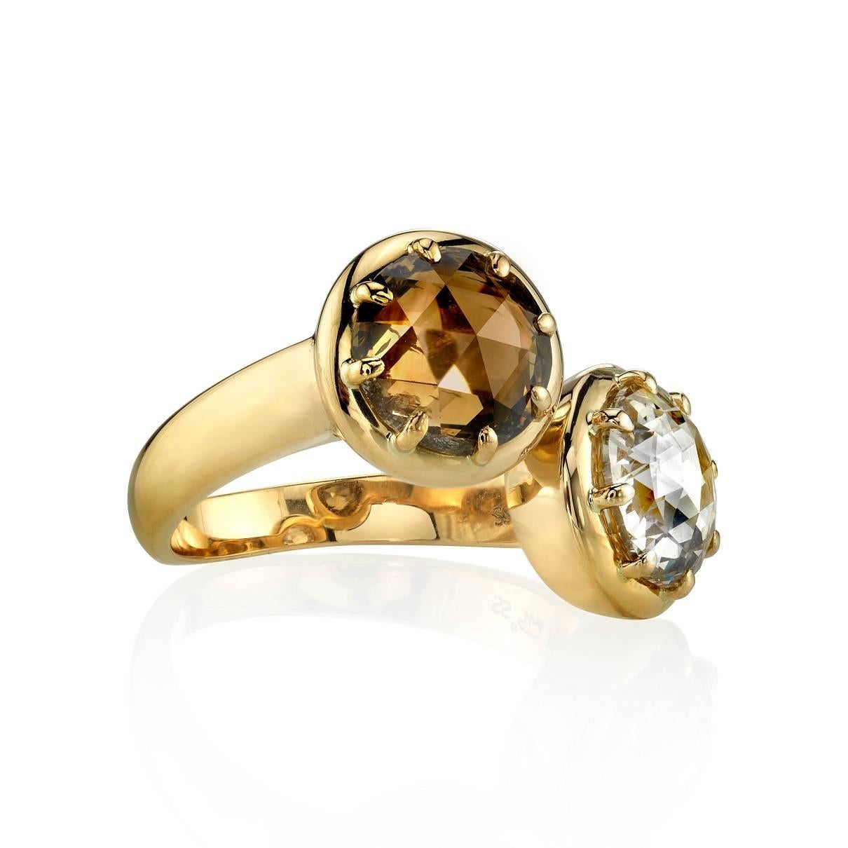 This beautiful bypass ring features a 2.24ct Dark Brown rose cut and a 2.05ct Light brown rose cut diamond set in a handcrafted 18k yellow gold ring. Smooth and comfortable, this ring is great as a right hand ring or alternative engagement ring. The