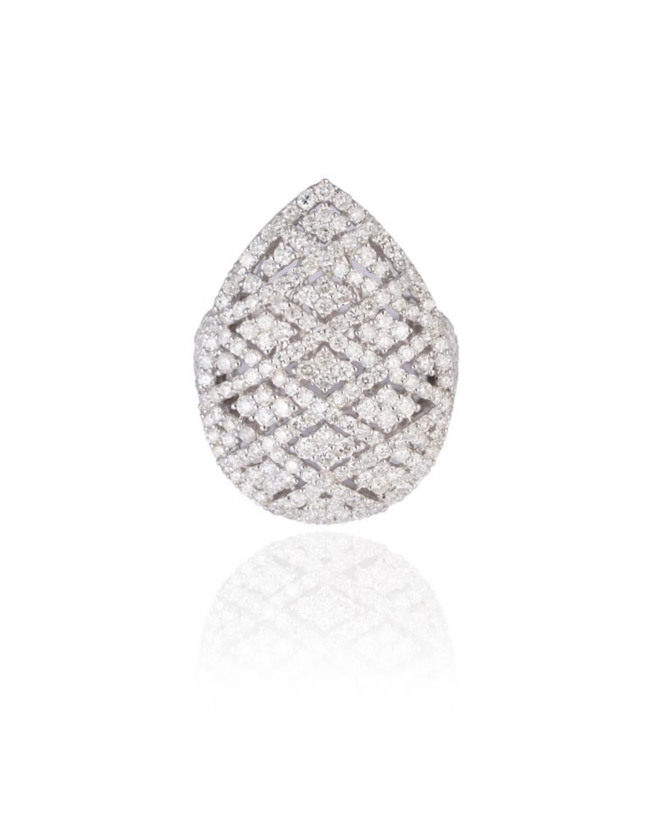 4.29 Ct Natural Brilliant cut Diamond Cocktail Ring in Pear Shape Size 6.75 in 18 Karat White gold
A Classic Beauty. This 18 Karat white gold ring  features 4.29 carat brilliant cut round shape diamonds that sit ever so beautifully and are enhanced