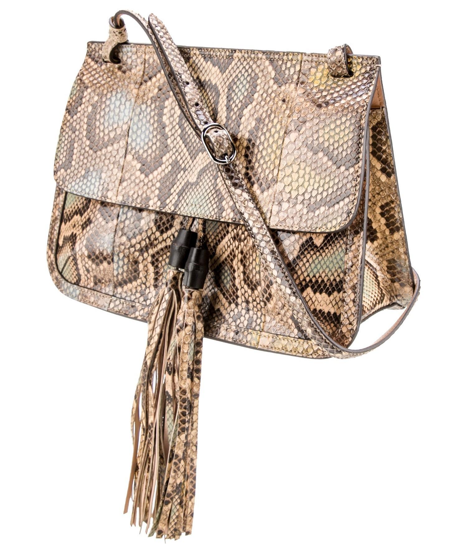 Brand New with Tags
Cruise 2015
Gucci
$4295
Neutral Python
Silver-Tone Hardware
Bamboo & Leather Trim
Single Adjustable Shoulder Strap
Tassel Accents
Leather Lining & Four Interior Pockets
Push-Lock Closure at Front
Unfortunately, due to
