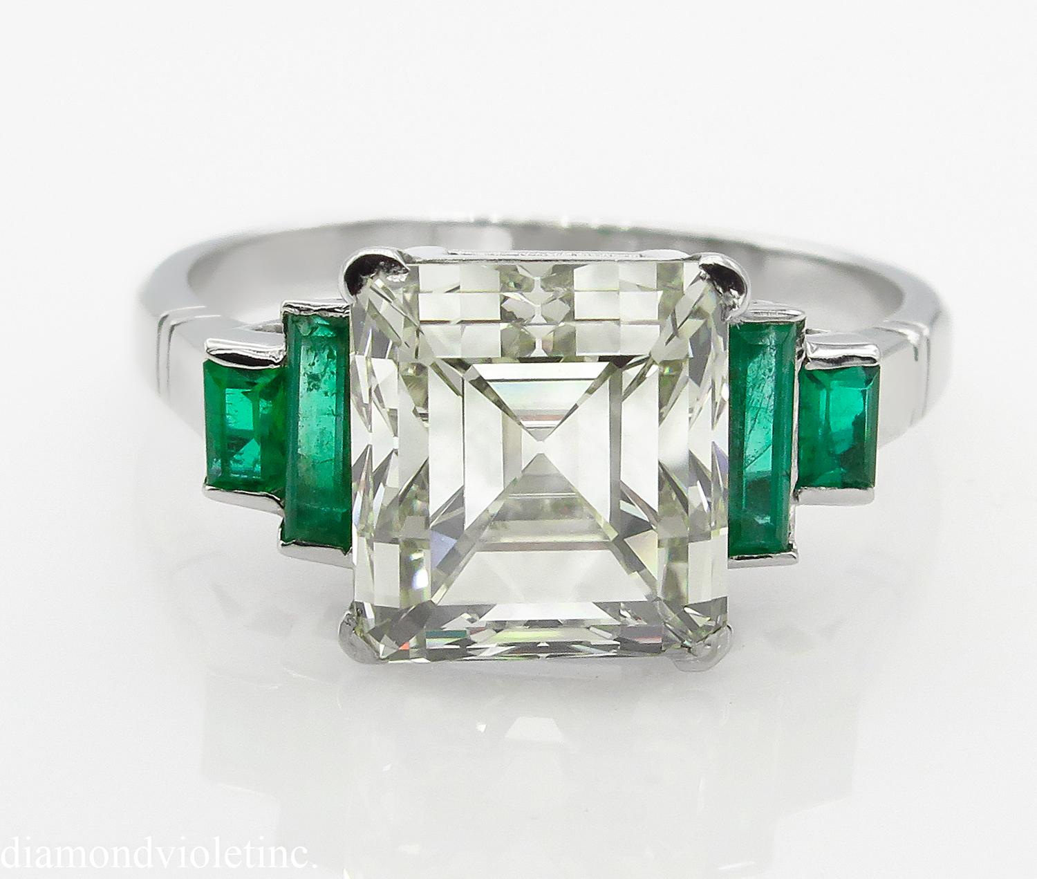 A Timeless Elegant Estate Vintage Diamond Engagement Ring with EG USA Certified 3.91ct Step cut Square Emerald Center Diamond in L-M color VS2 clarity (Very Clean); with measurements of 8.57x7.97x6.31mm; appears much LARGER than its size!!
It is set