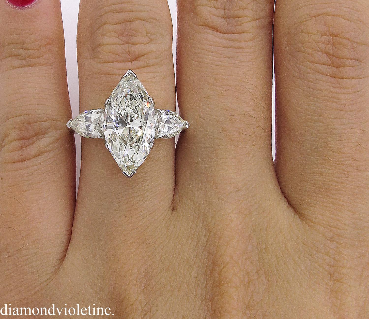 4.29 Carat Estate Vintage Marquise Diamond 3-Stone Wedding Platinum Ring 3