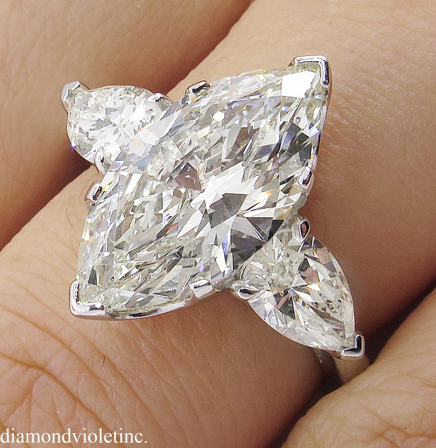 4.29 Carat Estate Vintage Marquise Diamond 3-Stone Wedding Platinum Ring 6