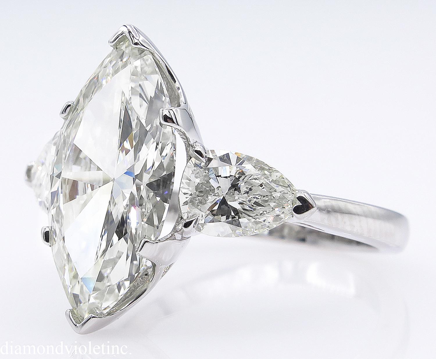 3 stone marquise engagement ring