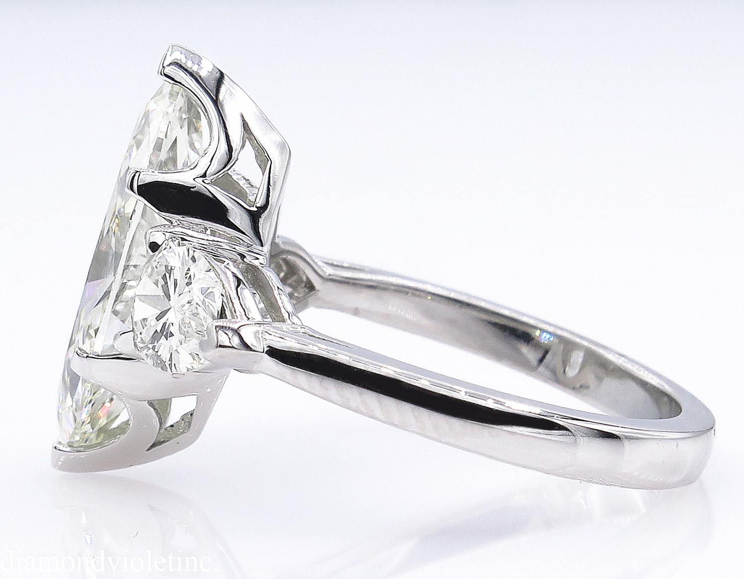 3 stone marquise diamond ring
