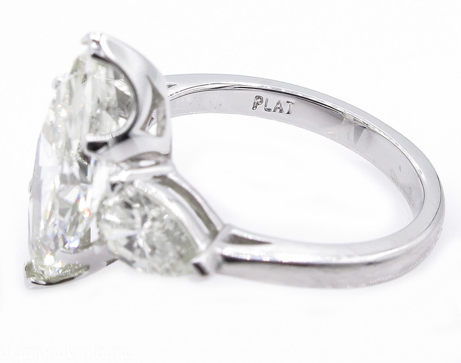 Marquise Cut 4.29 Carat Estate Vintage Marquise Diamond 3-Stone Wedding Platinum Ring