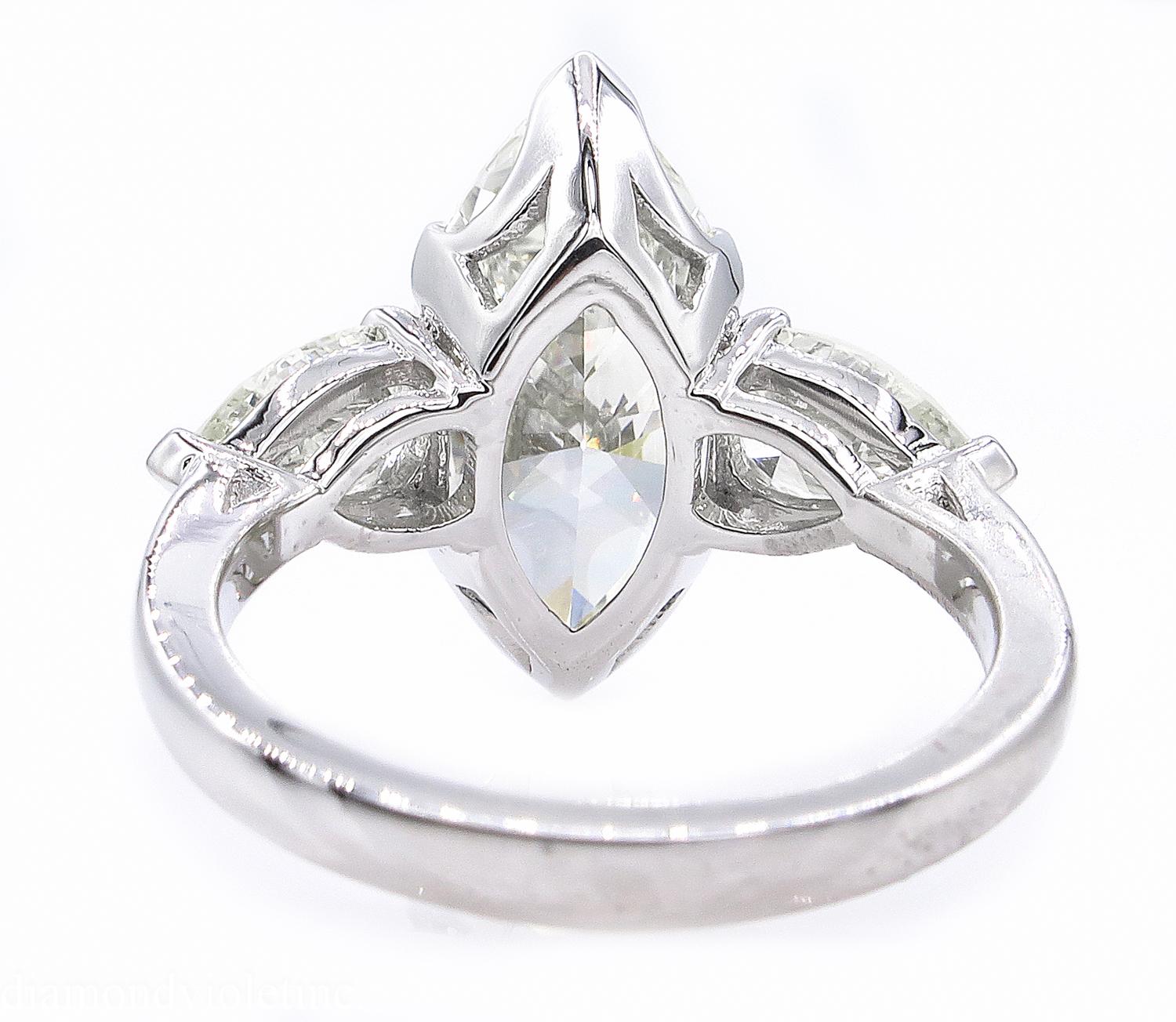 4.29 Carat Estate Vintage Marquise Diamond 3-Stone Wedding Platinum Ring In Good Condition In New York, NY