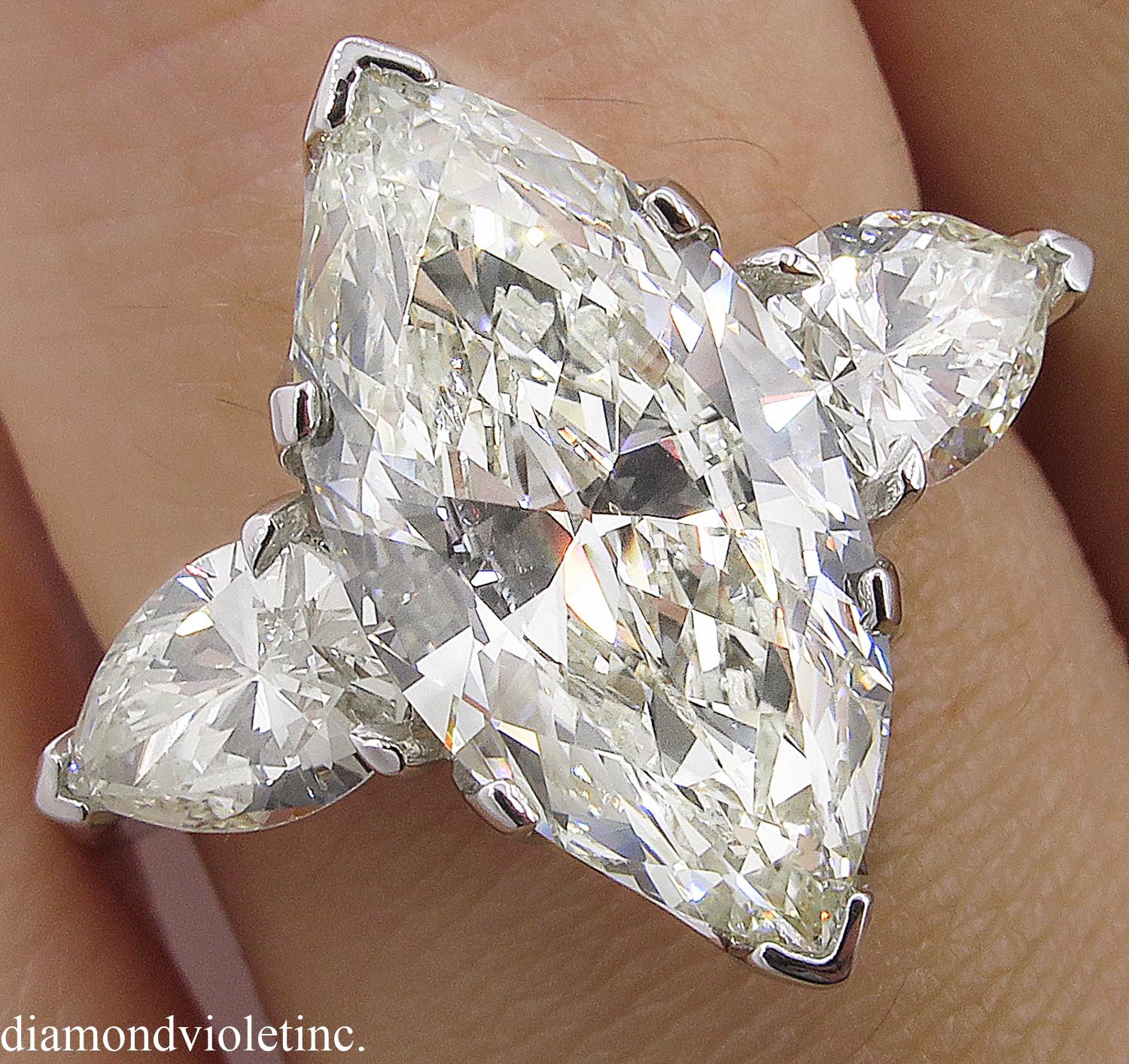 4.29 Carat Estate Vintage Marquise Diamond 3-Stone Wedding Platinum Ring 1