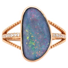 Anello Opale Boulder 4,2ct con diamanti estratti dalla terra in oro massiccio 14K  Fantasia 17x9mm