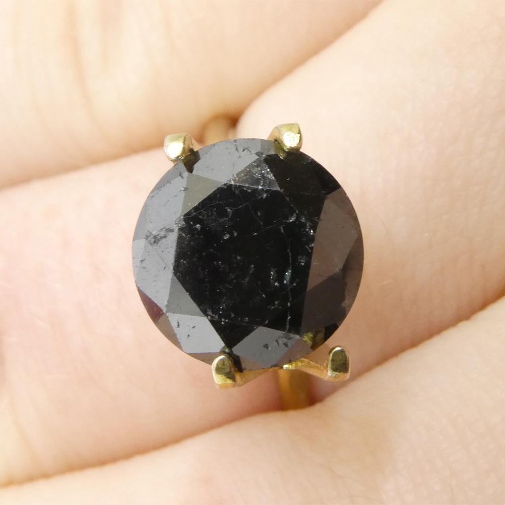 Description:

Gem Type: Diamond 
Number of Stones: 1
Weight: 4.2 cts
Measurements: 9.88 x 9.88 x 6.37 mm
Shape: Round
Cutting Style Crown: Brilliant Cut
Cutting Style Pavilion: Brilliant Cut 
Transparency: Opaque
Clarity: N/A
Colour: Black
Hue: