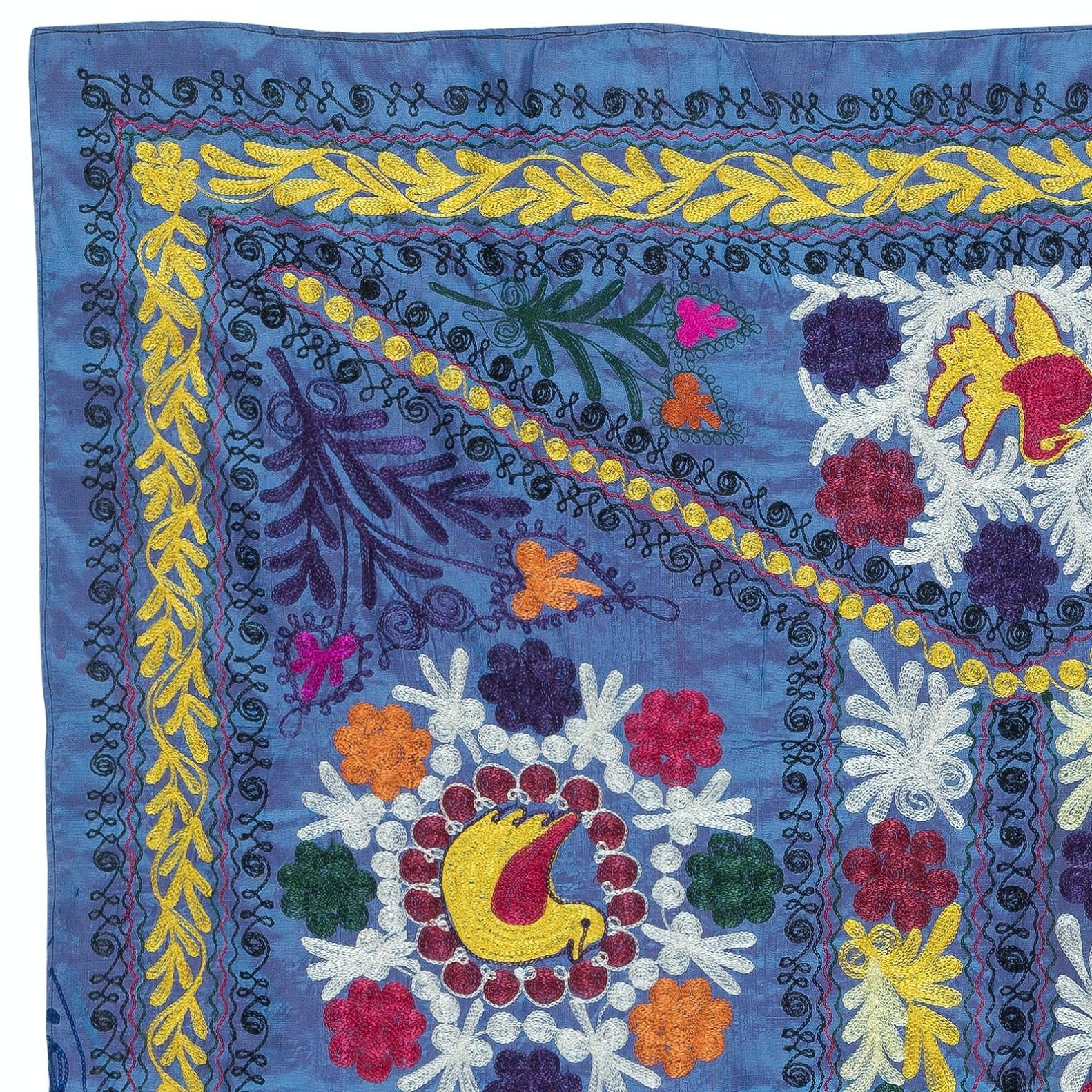 Introducing our exquisite new suzani hand embroidered wall hanging, a captivating piece that combines ancient craftsmanship with modern artistry. This embroidered cloth is not just a suzani throw, but a remarkable suzani wall hanging that will