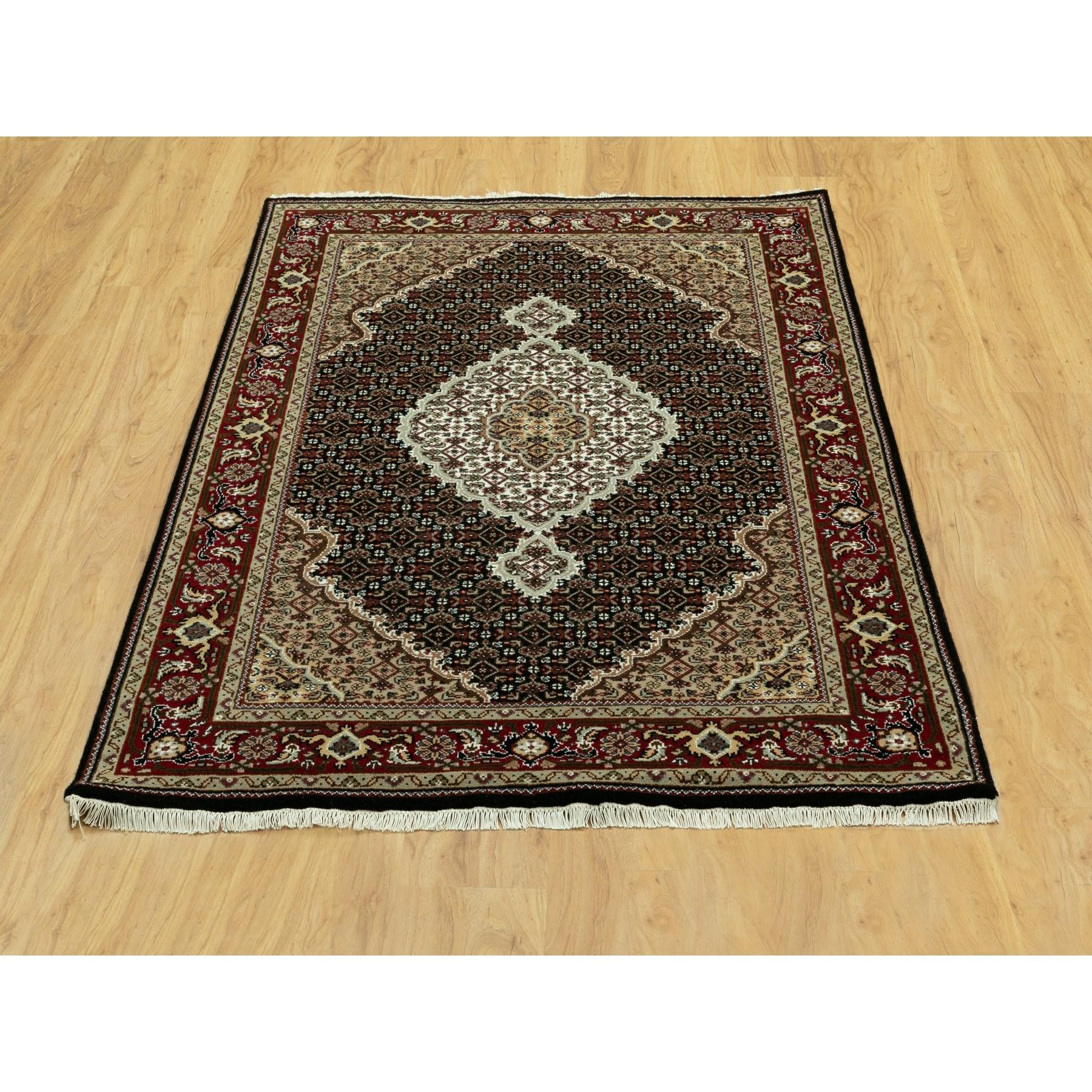This is a truly genuine one-of-a-kind Hand Knotted Wool Black Fish Design Tabriz Mahi Oriental Rug. It has been Knotted for months and months in the centuries-old weaving craftsmanship techniques by expert artisans.
Primary materials: Wool
Latex: No