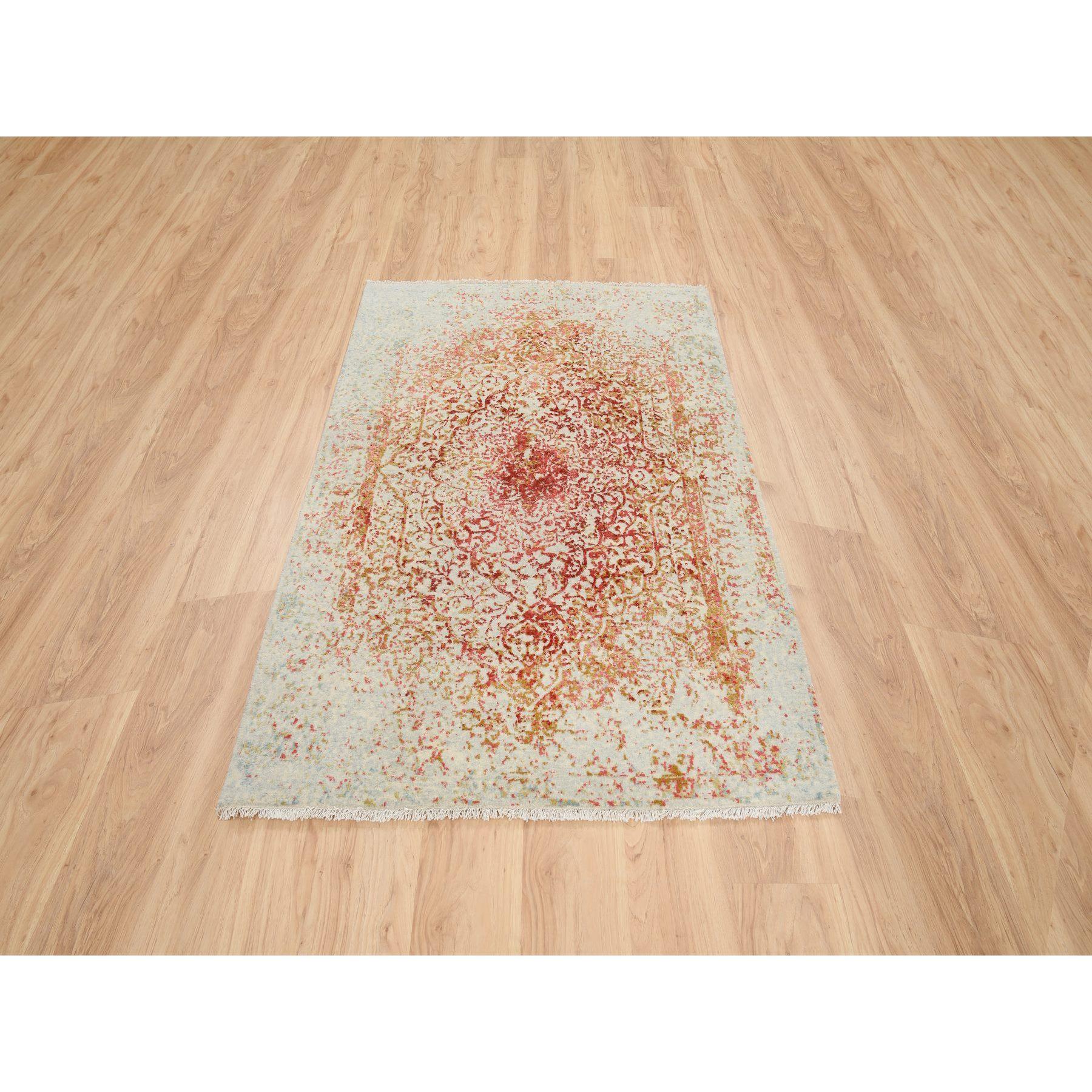 This is a truly genuine one-of-a-kind Ivory and Red, Hand Knotted Persian Erased Medallion Design, Wool and Pure Silk, Oriental Rug. It has been Knotted for months and months in the centuries-old weaving craftsmanship techniques by expert