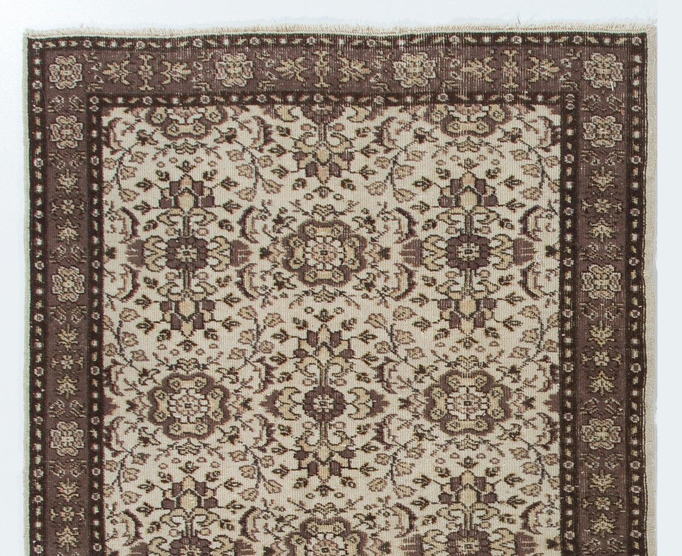 A vintage accent rug from Central Turkey. Finely hand-knotted with even medium wool pile on cotton foundation. Very good condition. Sturdy and as clean as a brand new rug (deep washed professionally). Measures: 4.2 x 6.8 ft.
     