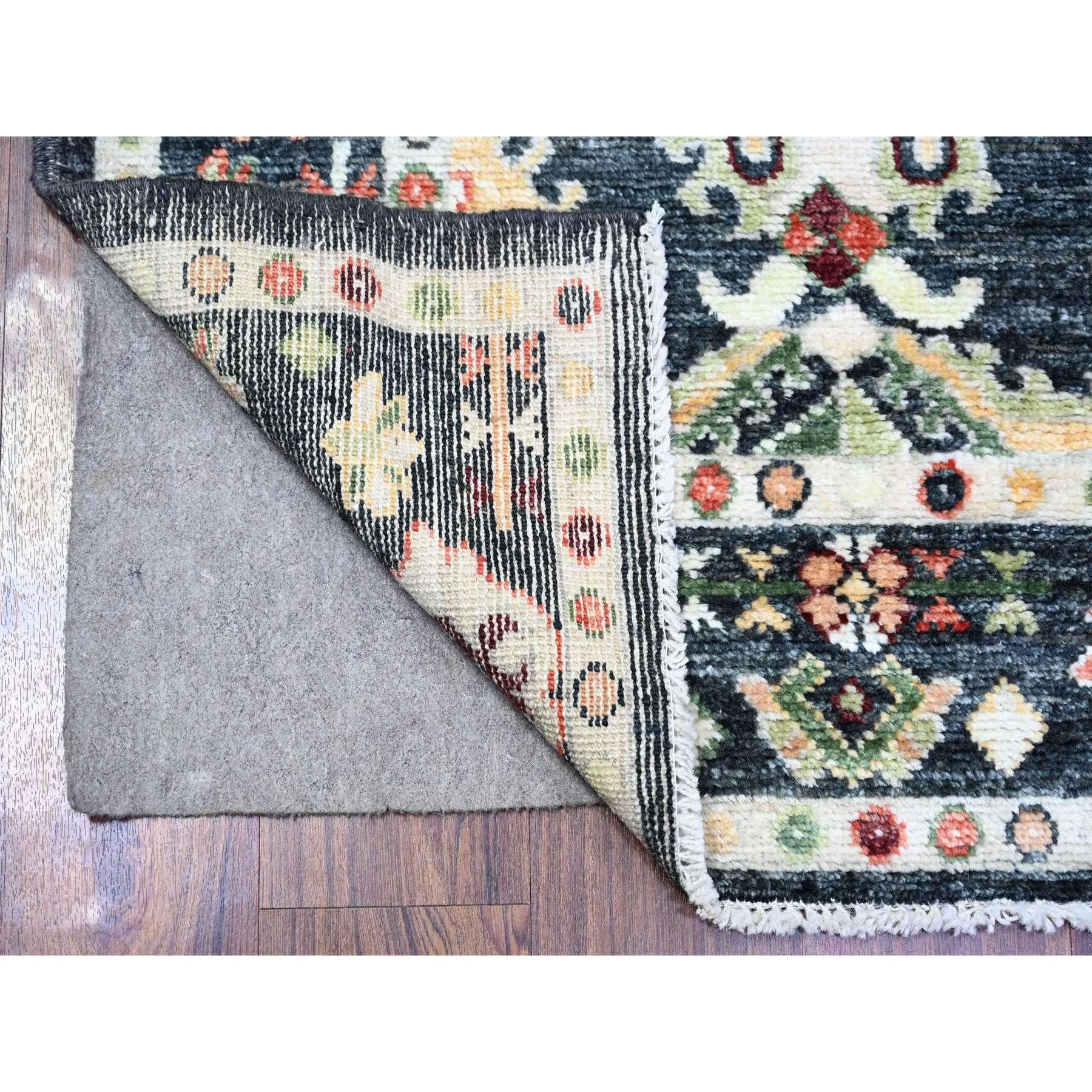 Gunmetal Black, Afghan Angora Oushak with Colorful Motifs Natural Dyes, Soft Wool Hand Knotted, Wide Runner Oriental Rug
Primary materials: Wool
Latex: No Pile 
height: 0.25 Inches
Style: Transitional
Primary color: Black
Secondary colors: Yellow,