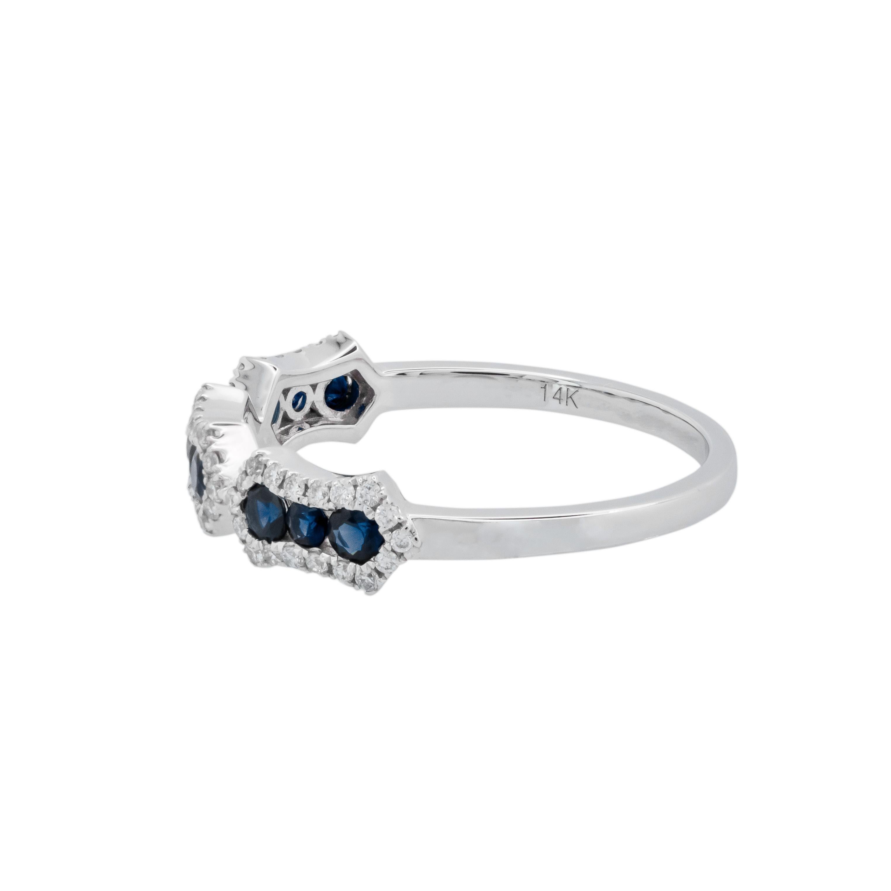 Crafted with precision and care, this ring boasts a dazzling 9 round sapphires that are encircled by a halo of 54 round brilliant cut sparkling diamonds, set in lustrous 14k white gold. The sapphires are in three groups of three with each group