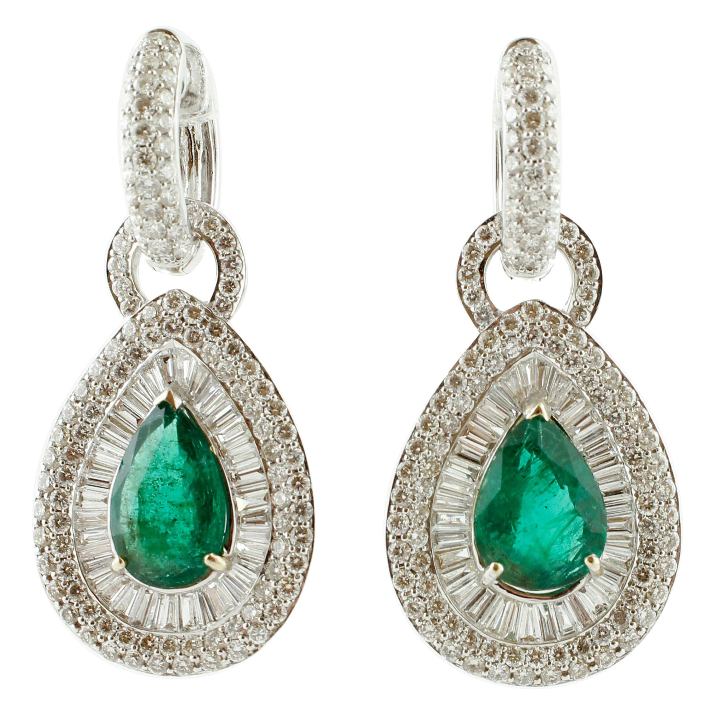 4.3 Ct Emerald Drops, 5.10 Ct White Diamonds, 18 Karat Gold Level-Back Earrings