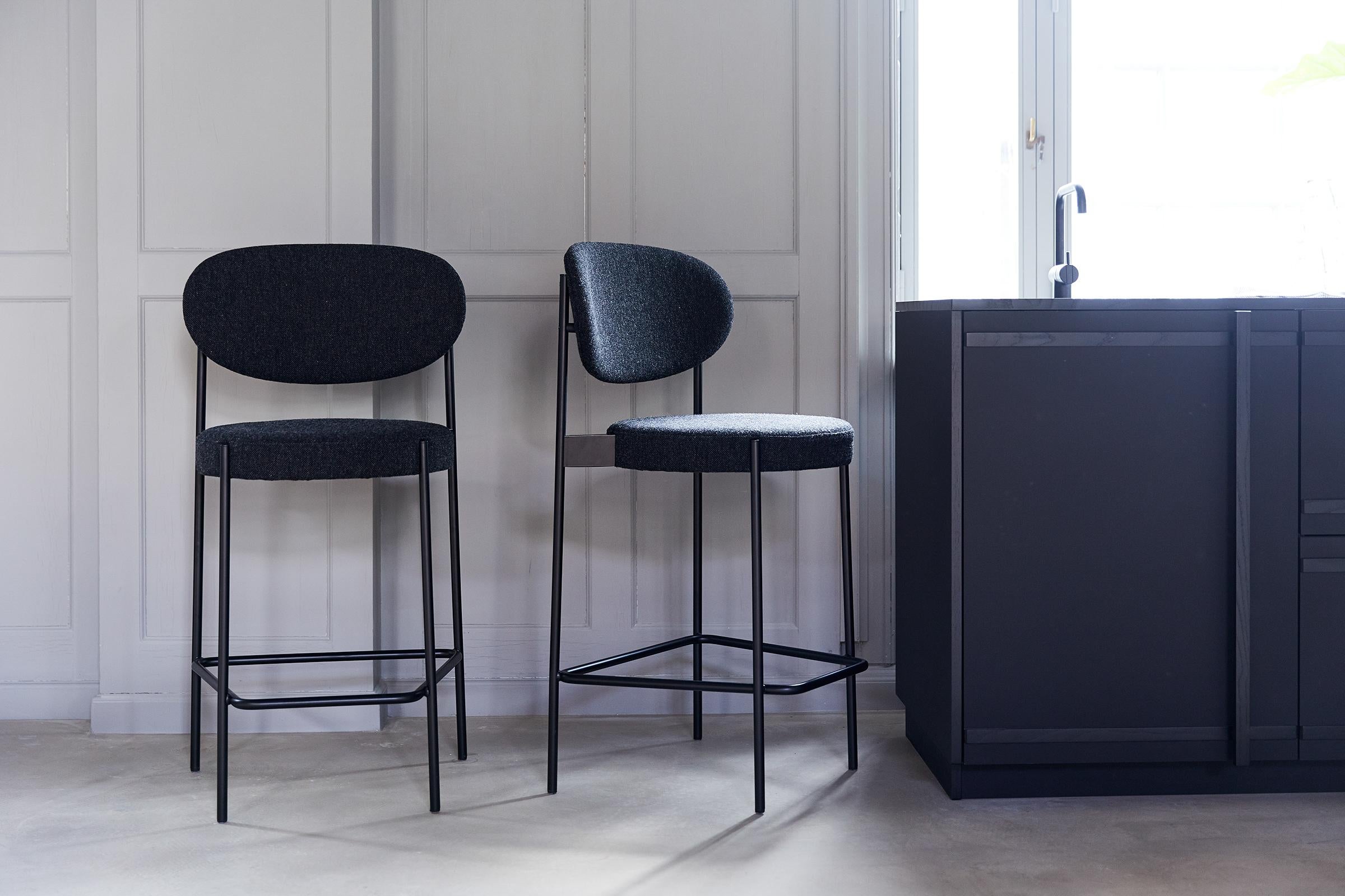 Fully upholstered stacking chair with black painted metal frame and felt feet.
It is the Nanna Ditzel designed fabric, Hallingdal from Kvadrat, color code 180.

CAL117 compliant foam can be made by request. Extra production time will be 5-6 weeks.