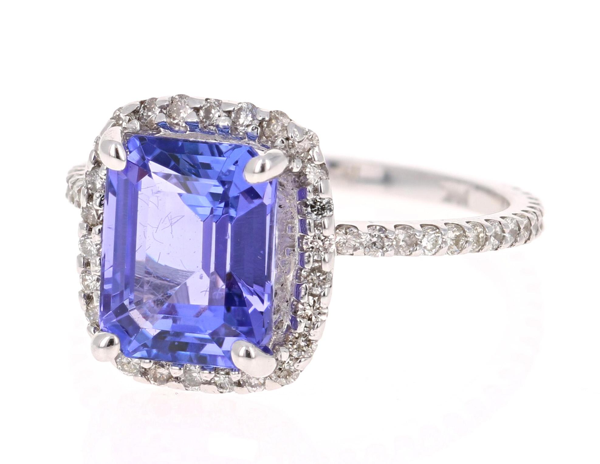 A gorgeous 4.30 Carat Tanzanite and Diamond Ring that can easily transform into a unique Engagement Ring for that special someone!

The Tanzanite is an Emerald cut stone and weighs 3.62 carats.  The ring is surrounded by a Halo of 74 Round Brilliant