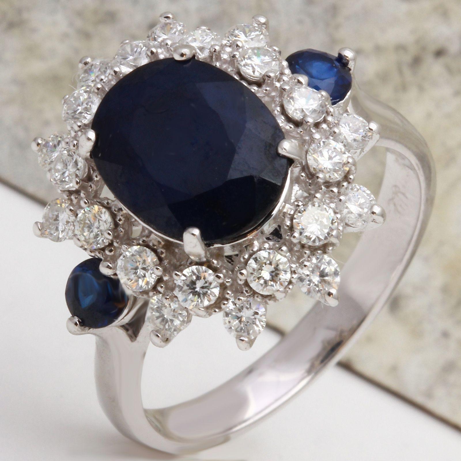 4.30 Carats Exquisite Natural Blue Sapphire and Diamond 14K Solid White Gold Ring

Total Natural Blue Sapphire Weights: 3.80 Carats

Sapphire Measures: 10 x 8mm

Sapphire Treatment: Diffusion

Natural Round Diamonds Weight: .50 Carats (color G-H /