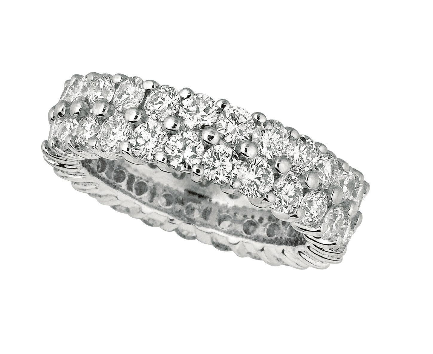 4,30 qt Diamante natural talla redonda Eternidad Anillo de 2 filas Banda G SI Oro blanco de 18 quilates

Diamantes 100% naturales, no mejorados de ninguna manera Banda de diamantes 
4.30CT
G-H 
SI  
oro blanco de 18 quilates  Engastado  8,80